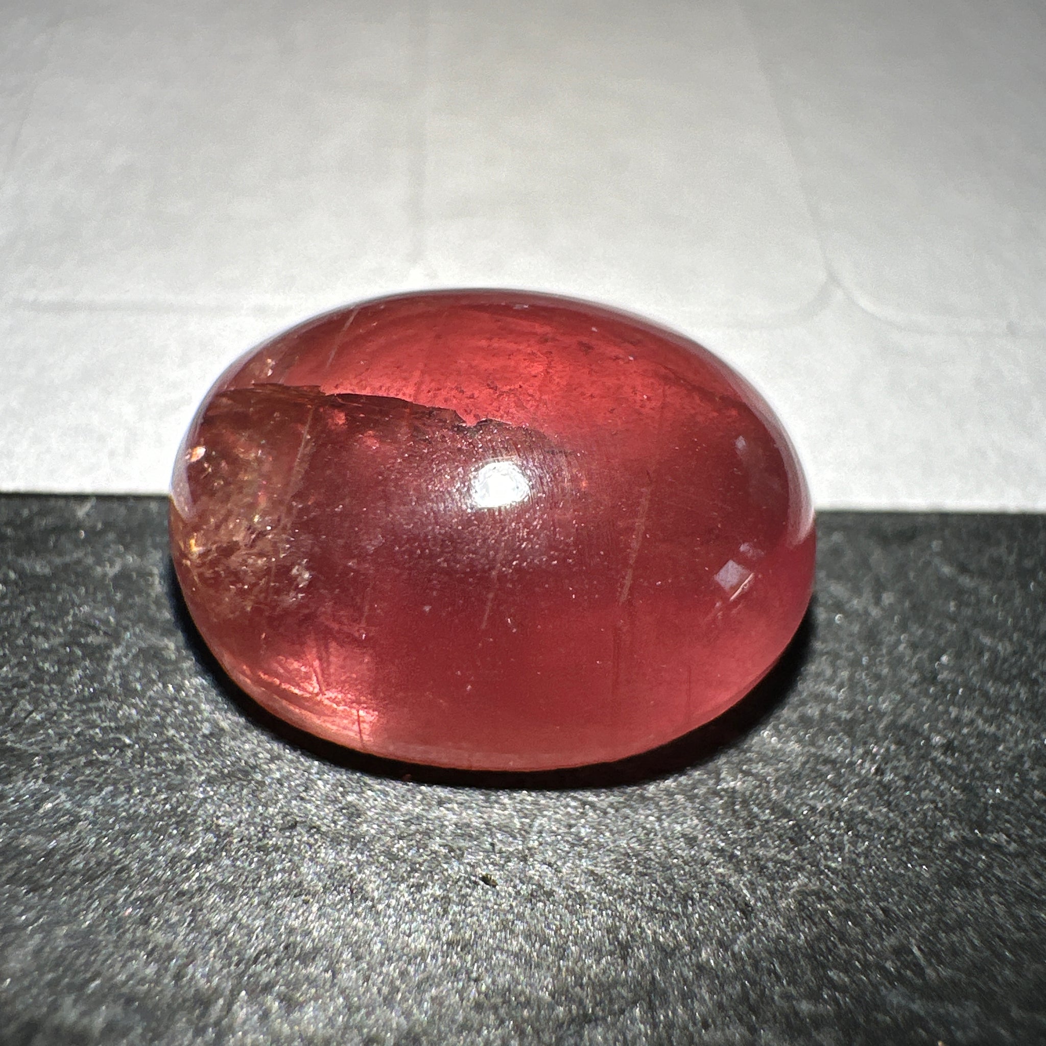Padparadscha Sapphire Cabochon, 6.57ct, Tanzania, UNTREATED UNHEATED. 11 x 8.2 x 5 mm, seems to have a colour shift