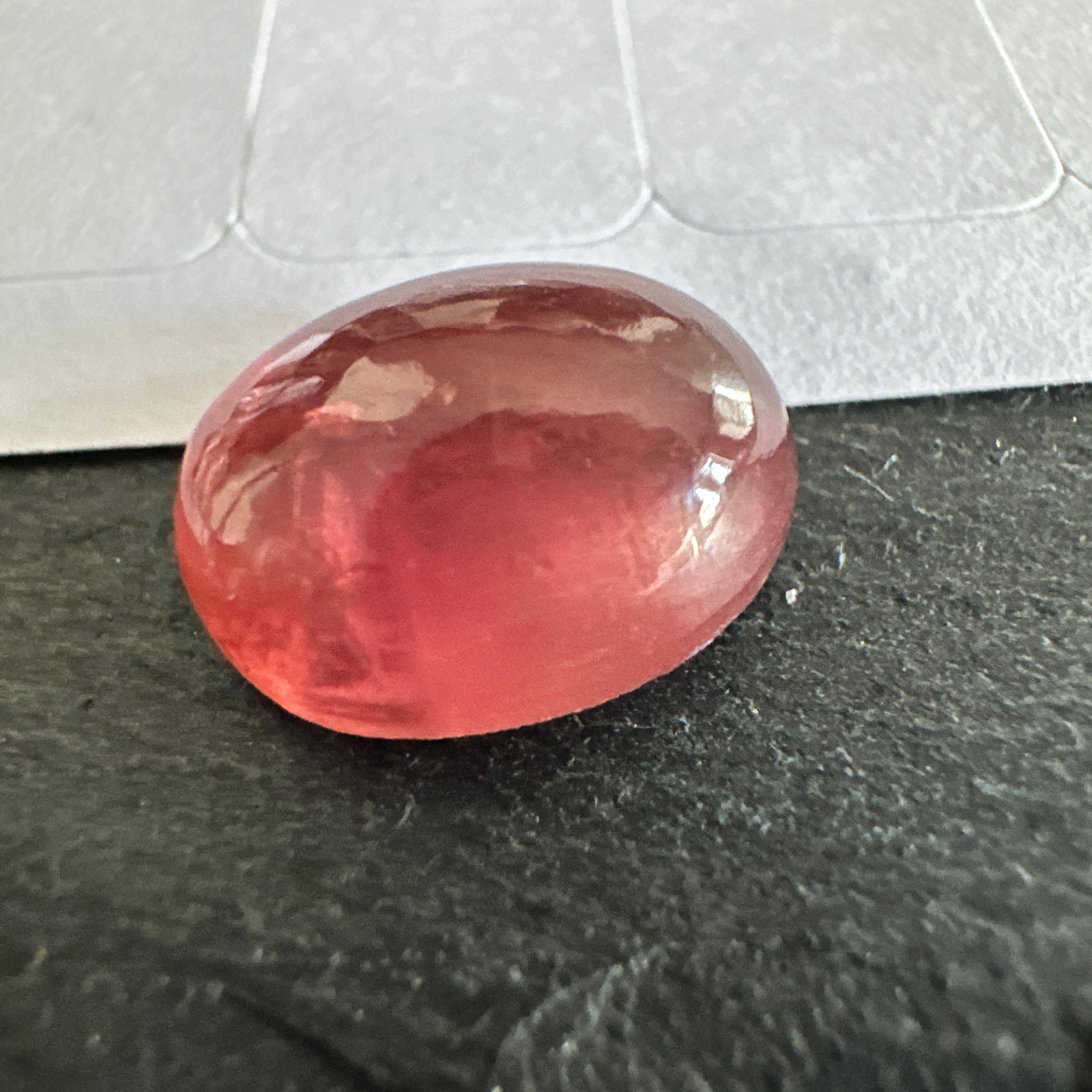 Padparadscha Sapphire Cabochon, 6.57ct, Tanzania, UNTREATED UNHEATED. 11 x 8.2 x 5 mm, seems to have a colour shift