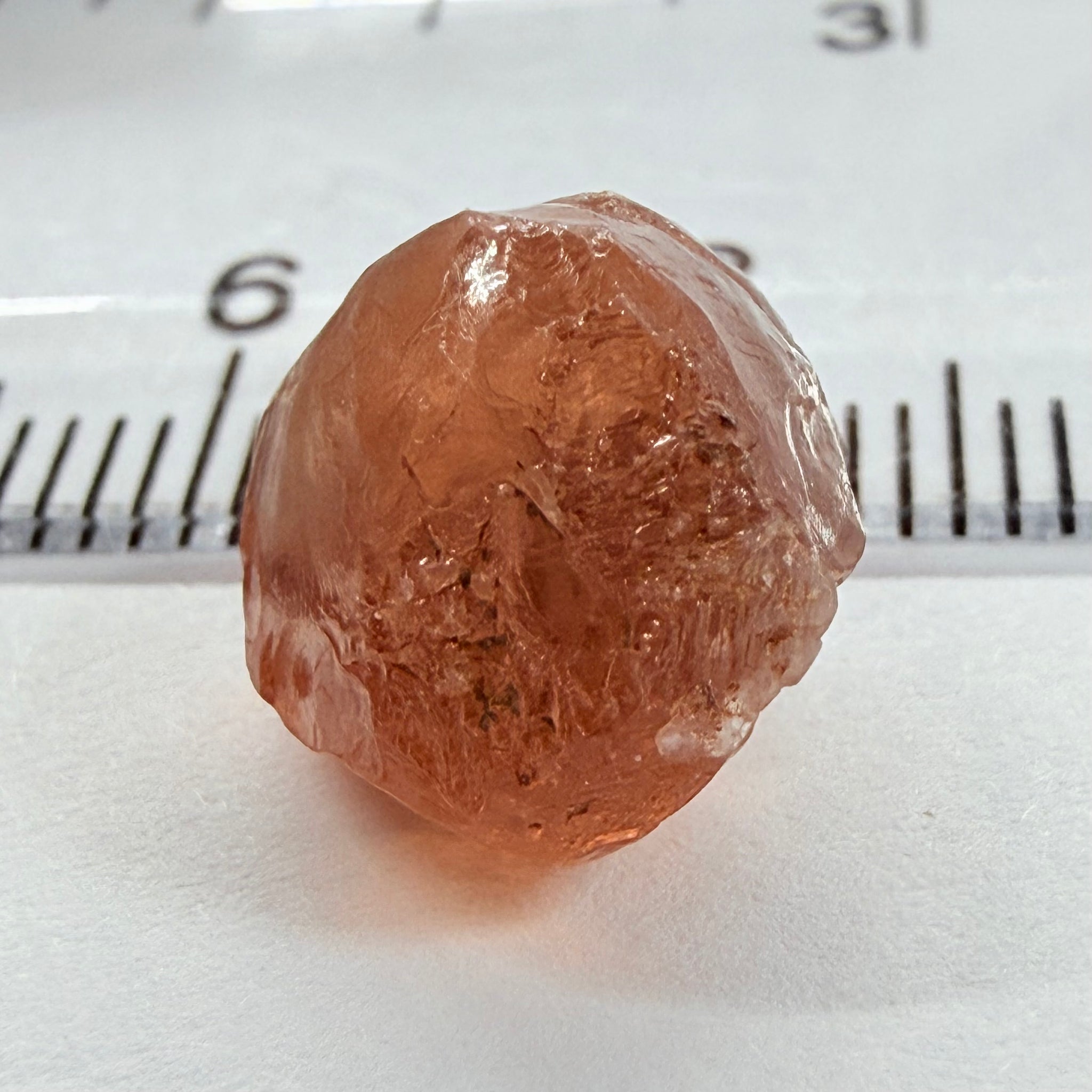 Malaya Garnet, 11.40ct, Umba Valley, Tanzania, Untreated Unheated, slight inclusions on the outer skin, will come off on disk while preforming and will take a couple of mm off the bottom, rest is slightly cloudyl