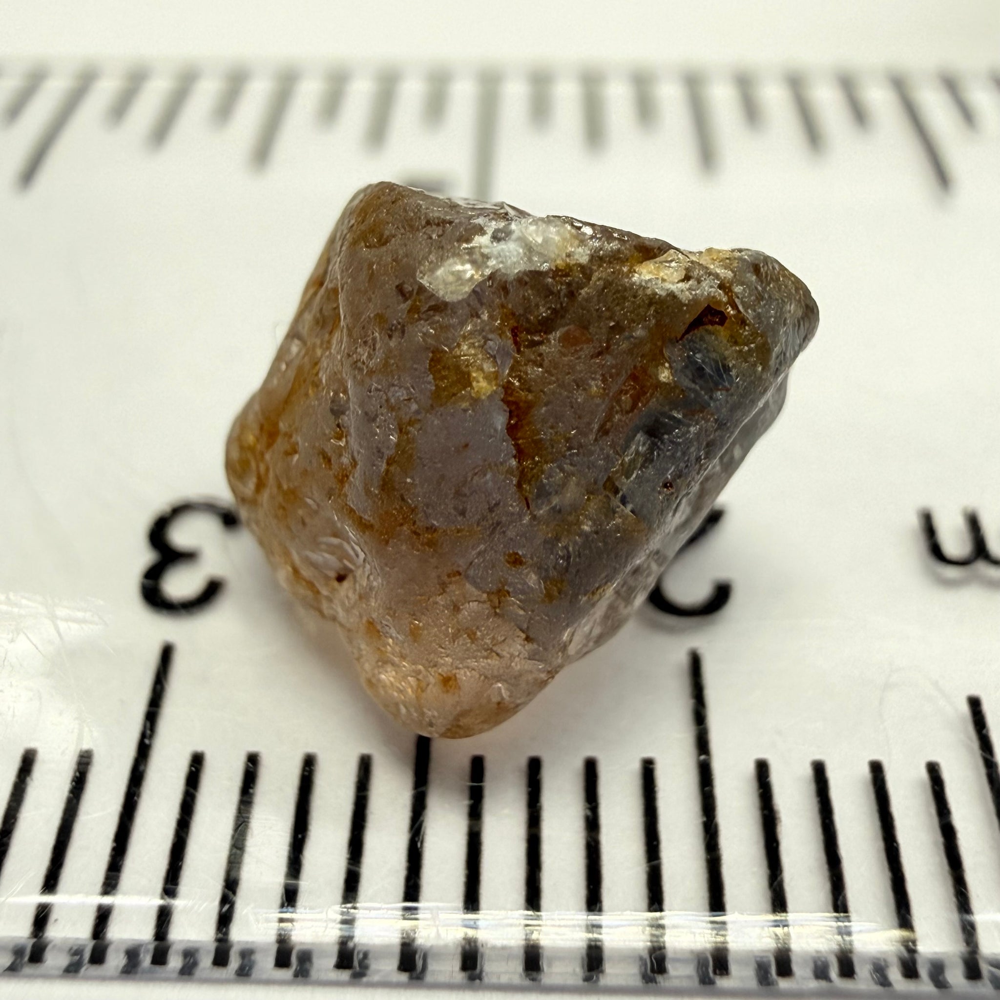 Umba Sapphire, 6.81ct, Umba, Tanzania, Untreated Unheated, fractures throughout the stone, cut as cab or facet with inclusions but there are quite a number