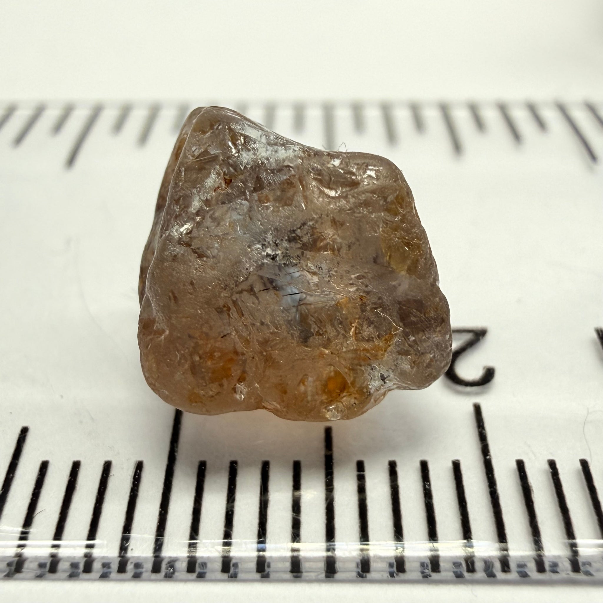 Umba Sapphire, 6.81ct, Umba, Tanzania, Untreated Unheated, fractures throughout the stone, cut as cab or facet with inclusions but there are quite a number