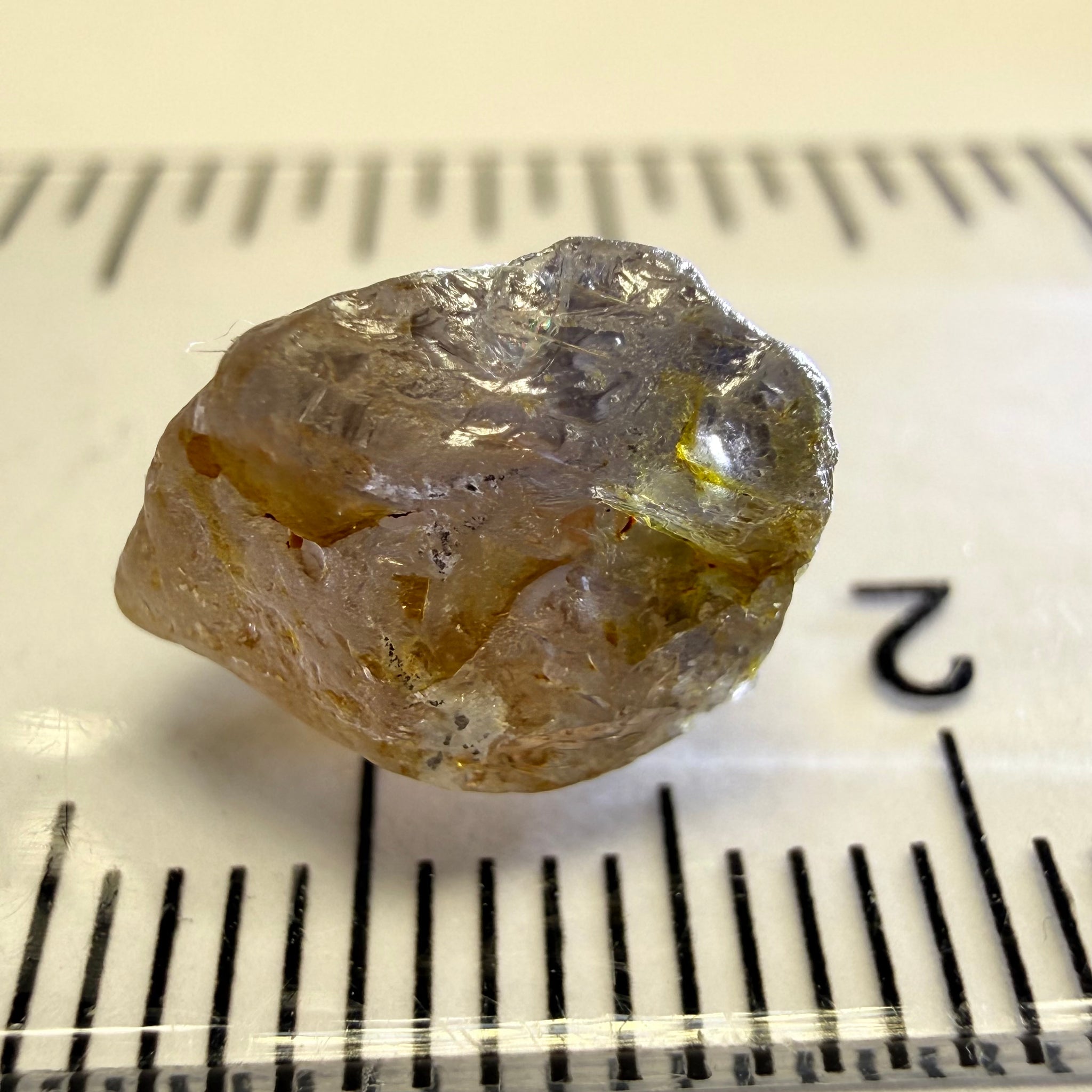 Umba Sapphire, 6.81ct, Umba, Tanzania, Untreated Unheated, fractures throughout the stone, cut as cab or facet with inclusions but there are quite a number