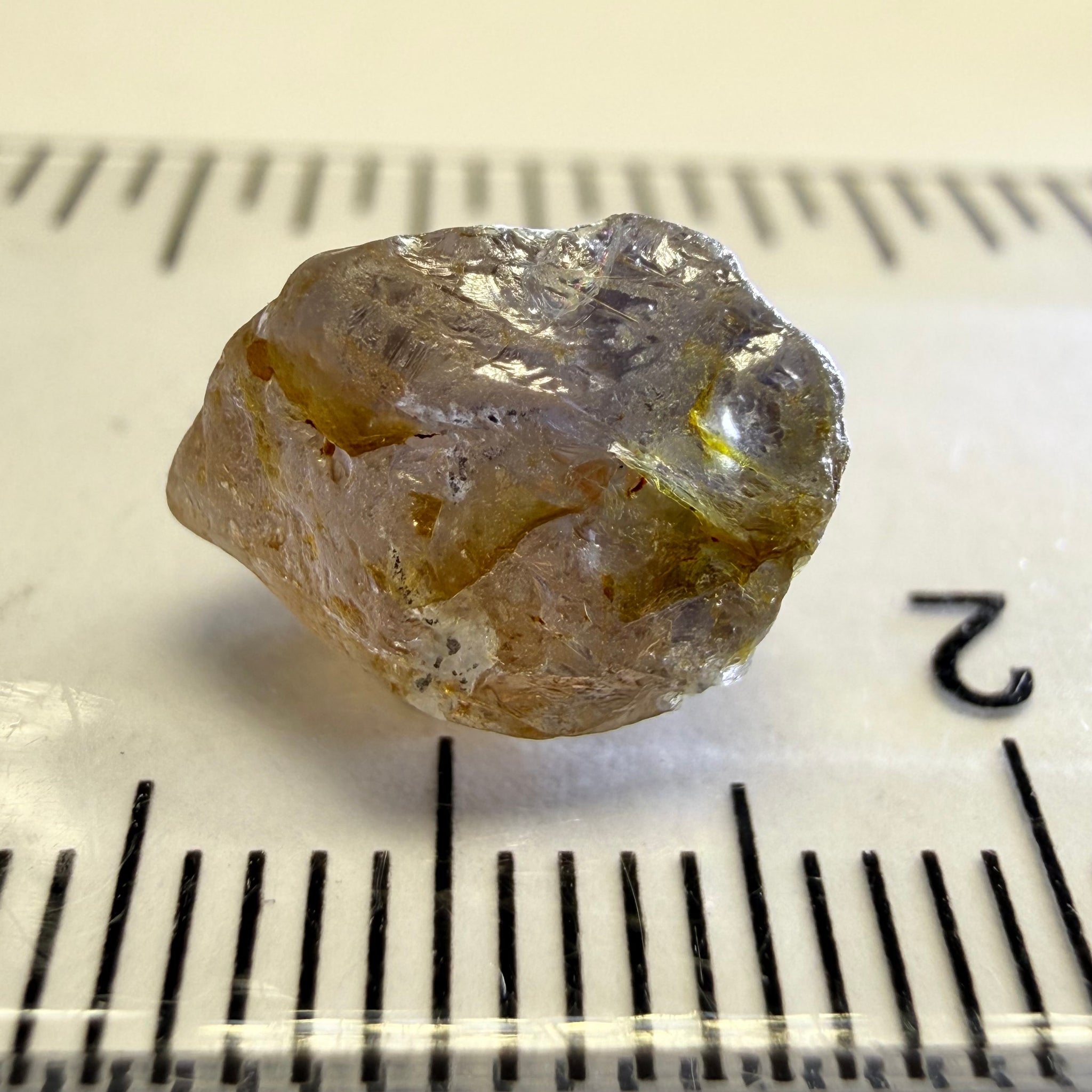 Umba Sapphire, 6.81ct, Umba, Tanzania, Untreated Unheated, fractures throughout the stone, cut as cab or facet with inclusions but there are quite a number