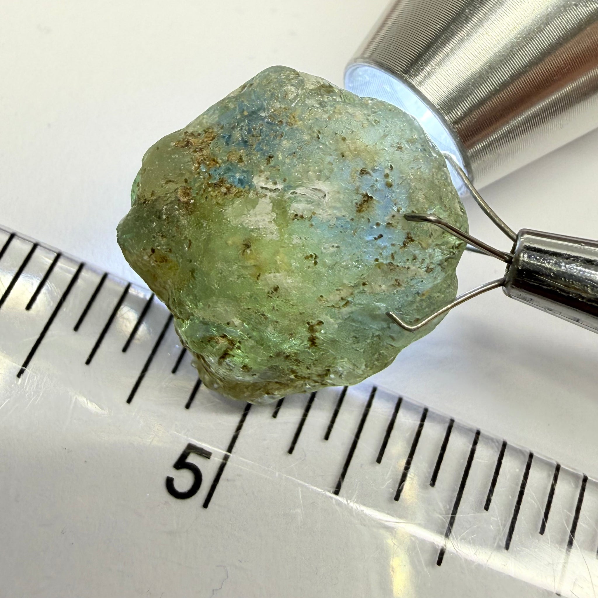 Umba Sapphire, 31.86ct, Umba, Tanzania, Untreated Unheated, low grade with a gemmy portion, you will have to grind though to get to it, portion is slightly to moderately included, see backlit photos