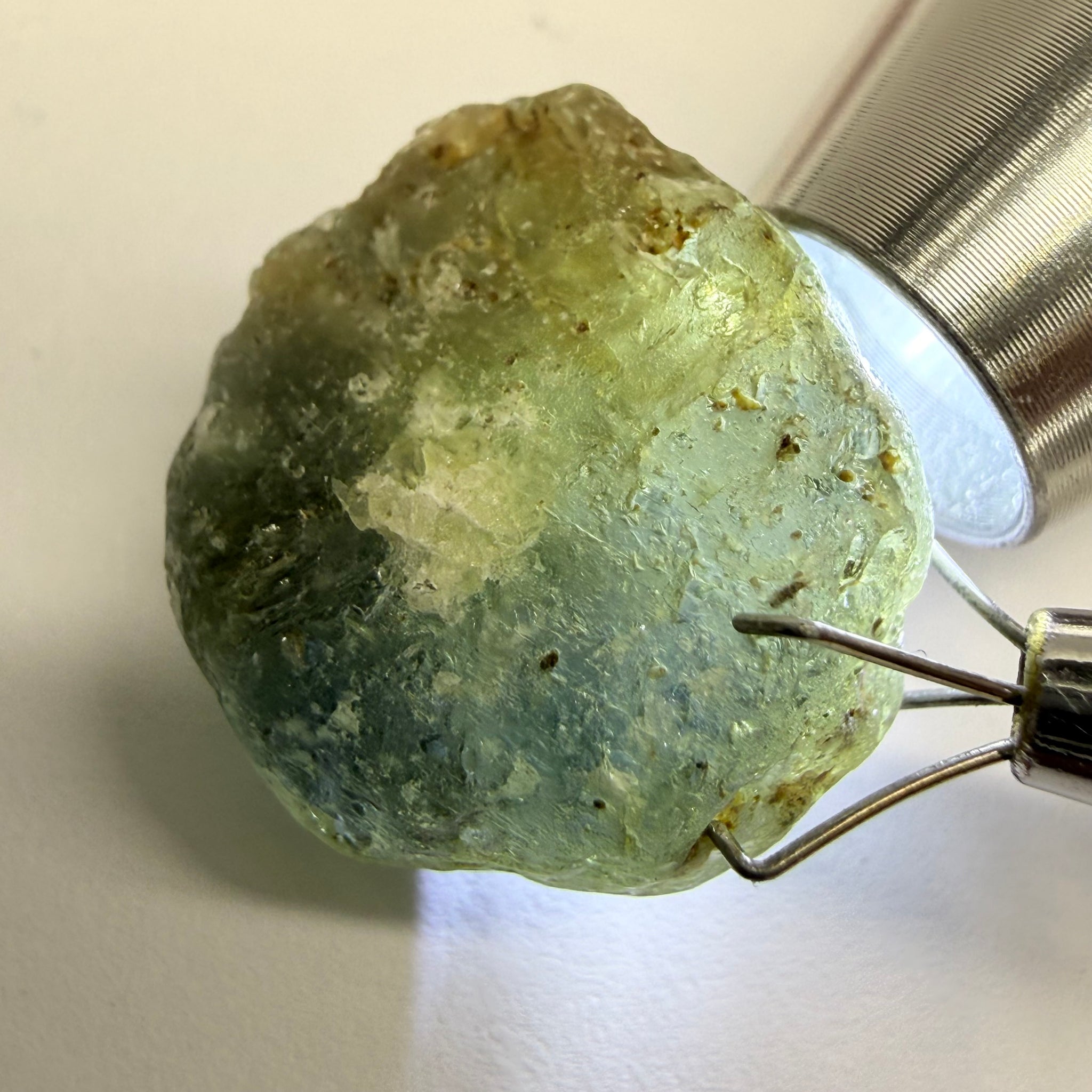 Umba Sapphire, 31.86ct, Umba, Tanzania, Untreated Unheated, low grade with a gemmy portion, you will have to grind though to get to it, portion is slightly to moderately included, see backlit photos