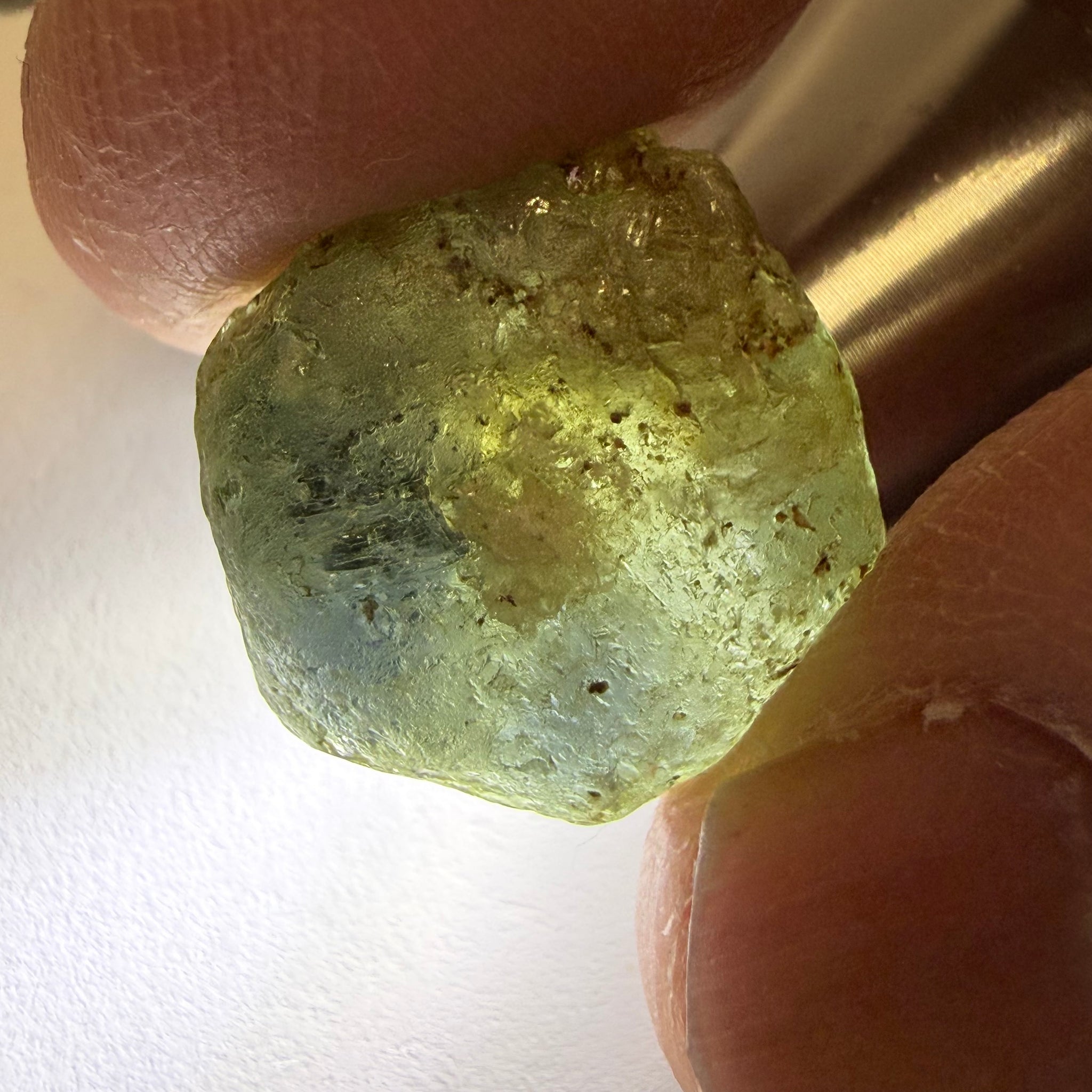 Umba Sapphire, 31.86ct, Umba, Tanzania, Untreated Unheated, low grade with a gemmy portion, you will have to grind though to get to it, portion is slightly to moderately included, see backlit photos
