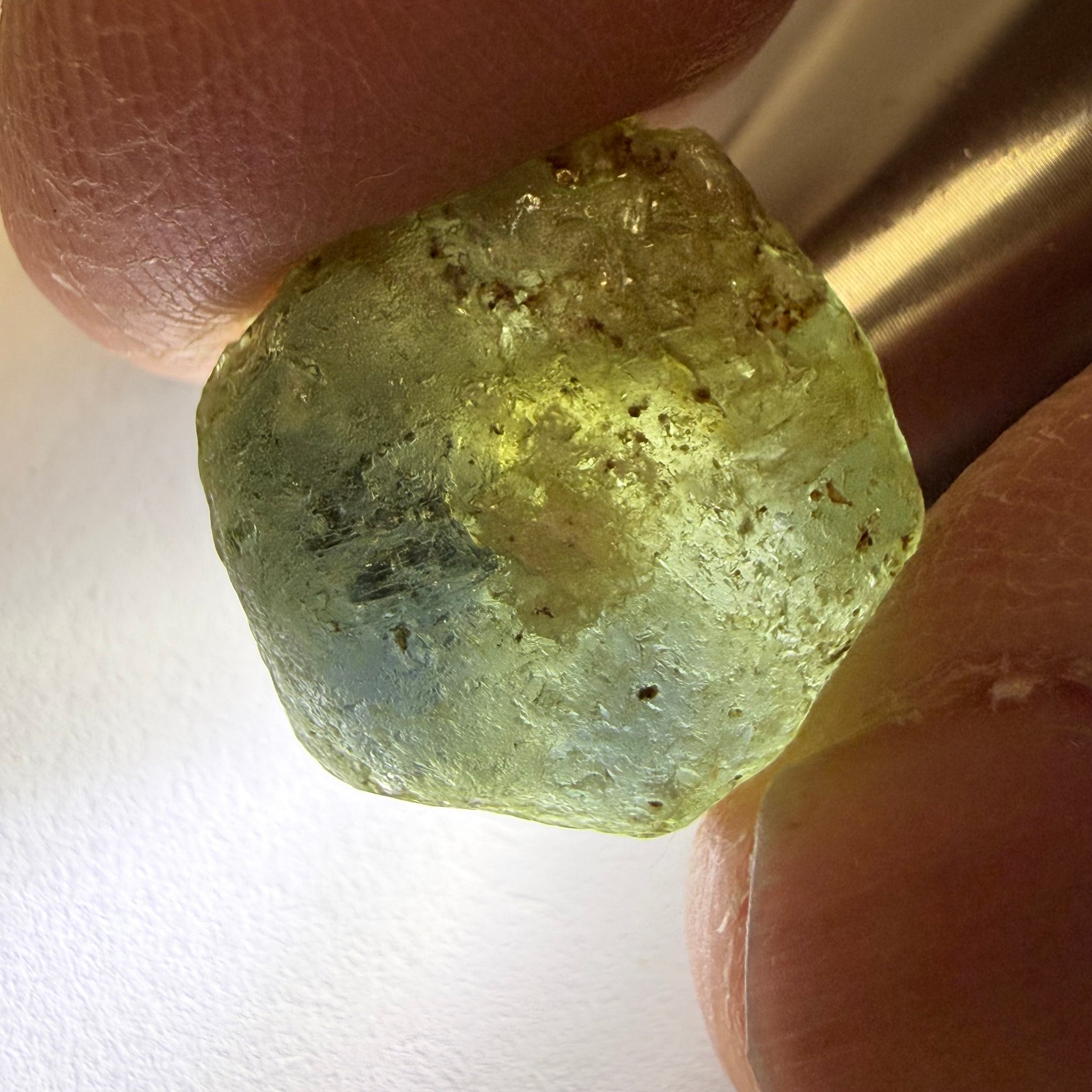 Umba Sapphire, 31.86ct, Umba, Tanzania, Untreated Unheated, low grade with a gemmy portion, you will have to grind though to get to it, portion is slightly to moderately included, see backlit photos