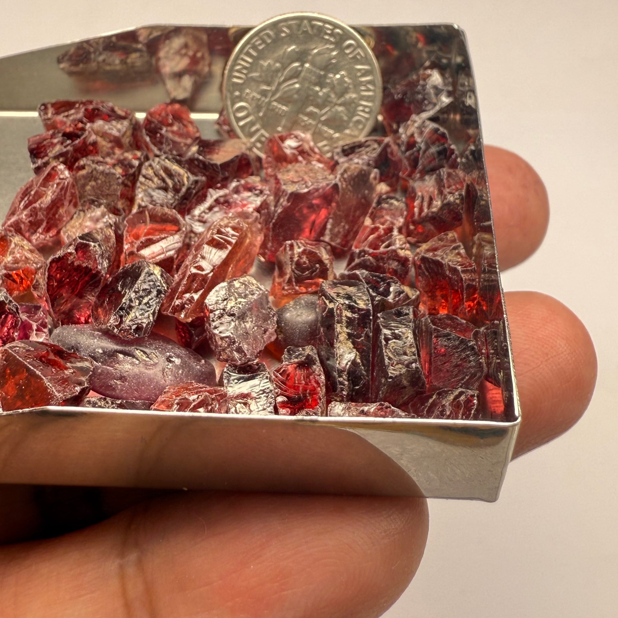 Umba Garnets, Umba Valley, Tanzania, Untreated Unheated. SINGLES price is per piece sold on a blind pour basis, FACETING ROUGH, EYE CLEAN TO SLIGHTLY UNDER EYE CLEAN, av. 3.70ct