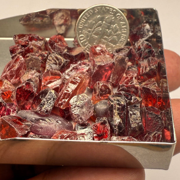 Umba Garnets, Umba Valley, Tanzania, Untreated Unheated. SINGLES price is per piece sold on a blind pour basis, FACETING ROUGH, EYE CLEAN TO SLIGHTLY UNDER EYE CLEAN, av. 3.70ct
