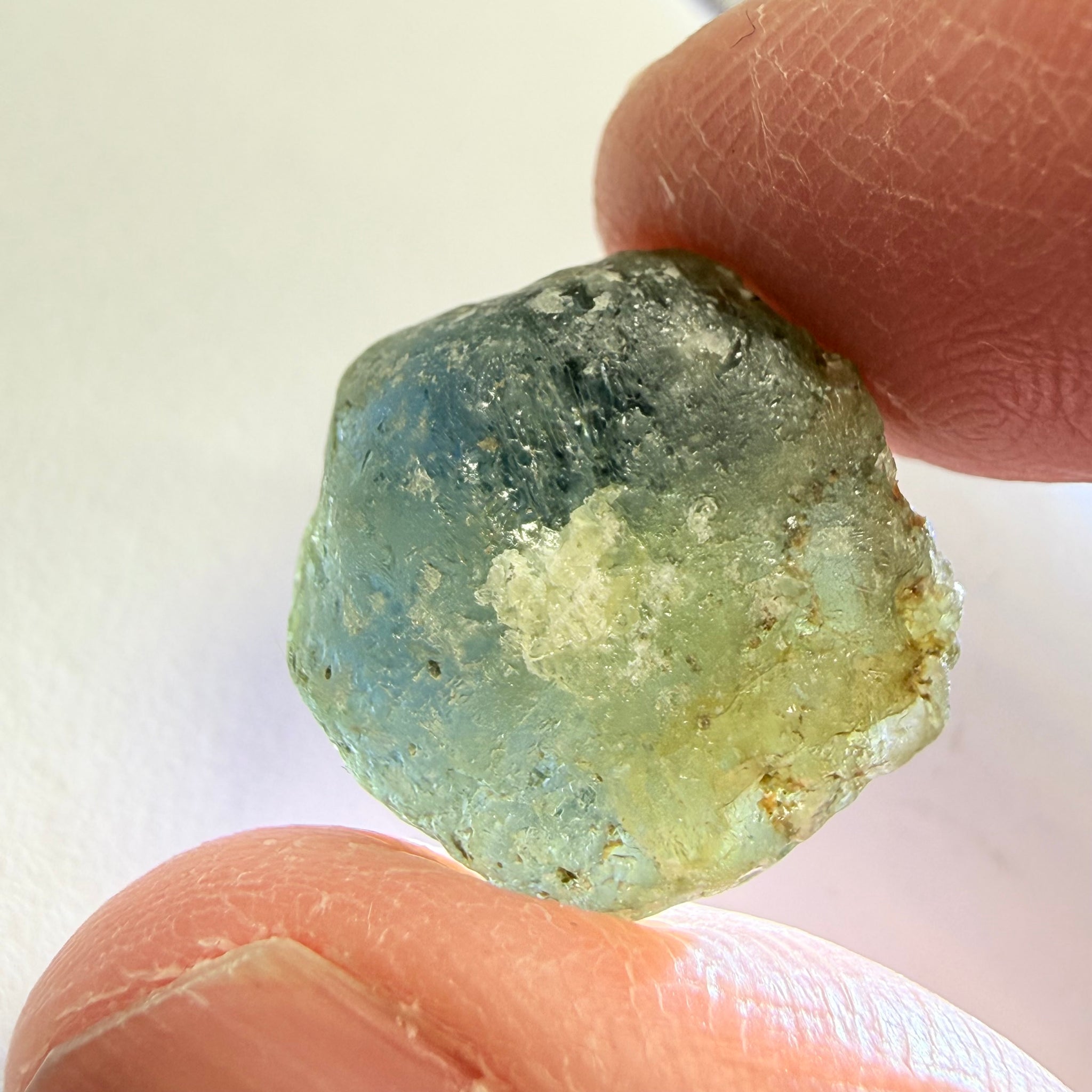 Umba Sapphire, 31.86ct, Umba, Tanzania, Untreated Unheated, low grade with a gemmy portion, you will have to grind though to get to it, portion is slightly to moderately included, see backlit photos