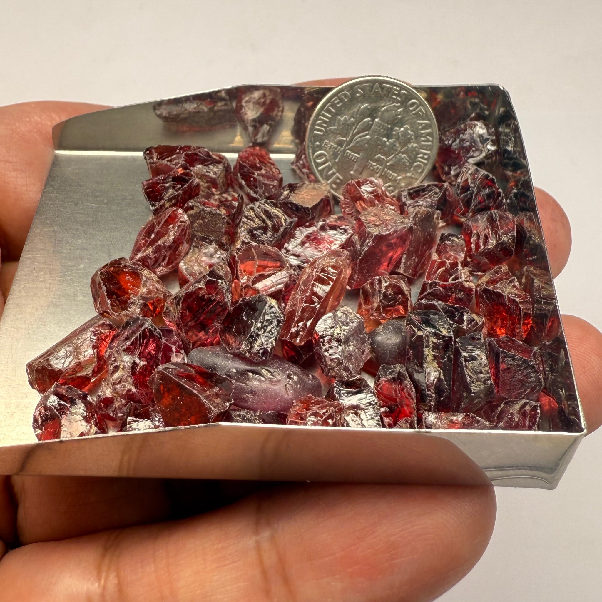 Umba Garnets, Umba Valley, Tanzania, Untreated Unheated. SINGLES price is per piece sold on a blind pour basis, FACETING ROUGH, EYE CLEAN TO SLIGHTLY UNDER EYE CLEAN, av. 3.70ct