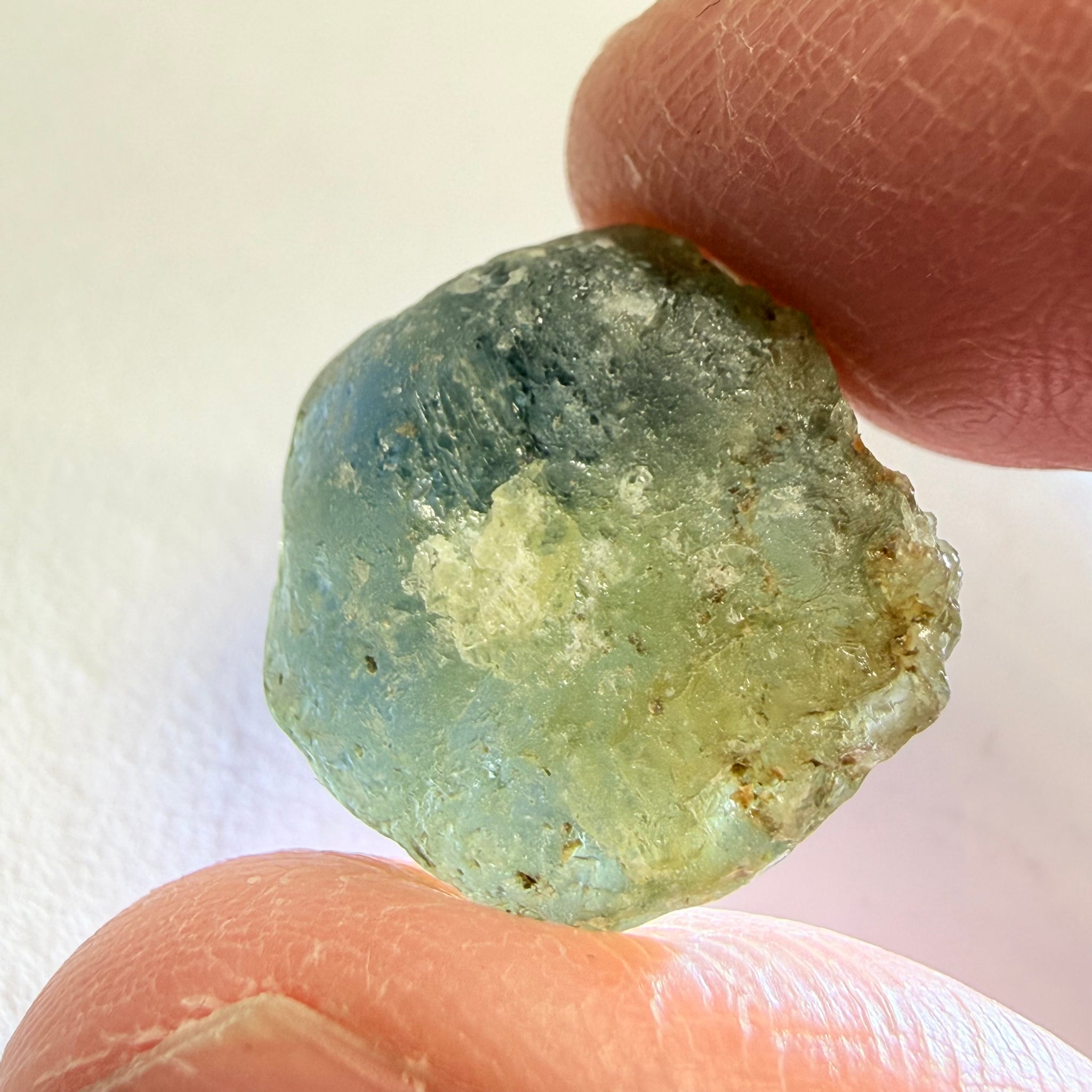 Umba Sapphire, 31.86ct, Umba, Tanzania, Untreated Unheated, low grade with a gemmy portion, you will have to grind though to get to it, portion is slightly to moderately included, see backlit photos