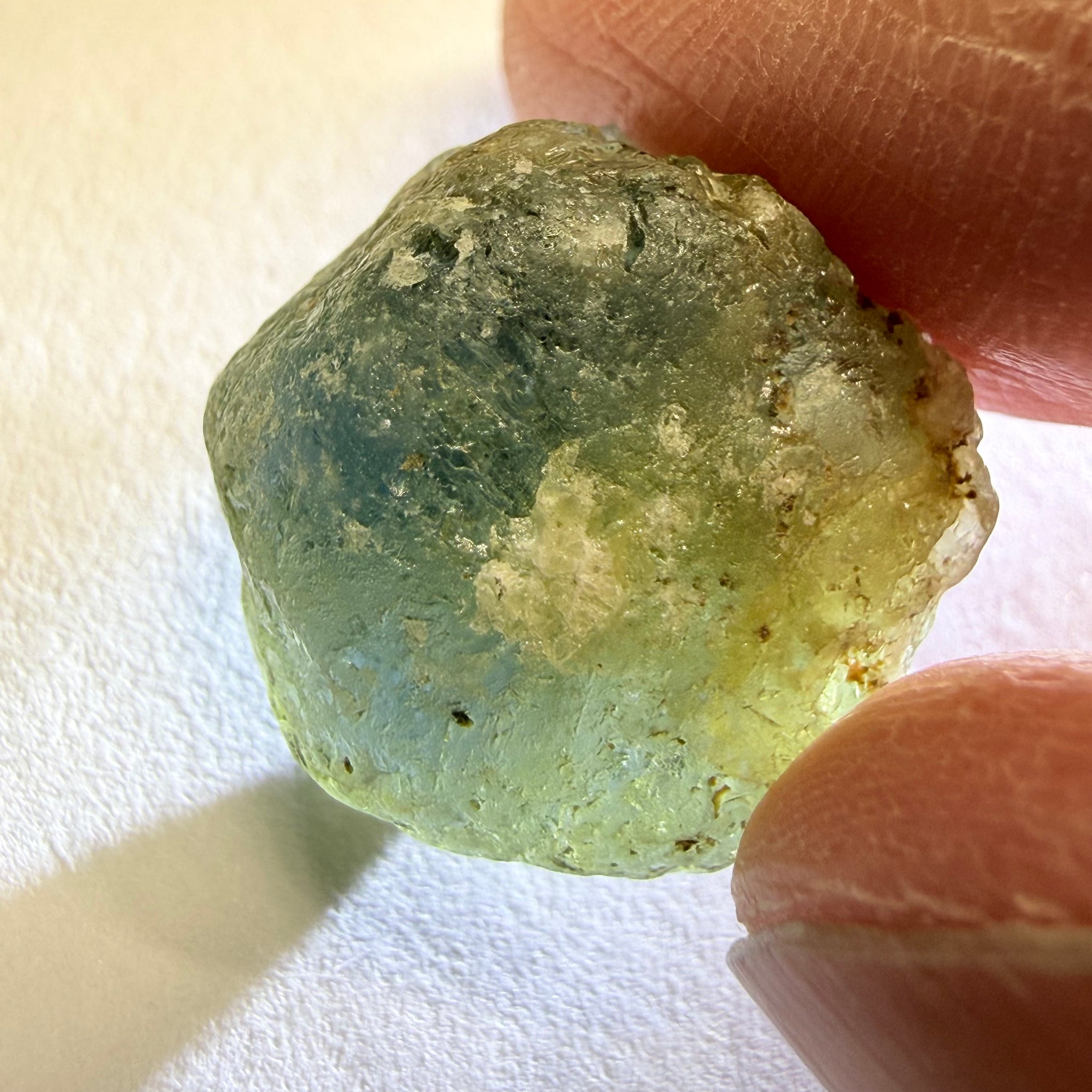 Umba Sapphire, 31.86ct, Umba, Tanzania, Untreated Unheated, low grade with a gemmy portion, you will have to grind though to get to it, portion is slightly to moderately included, see backlit photos