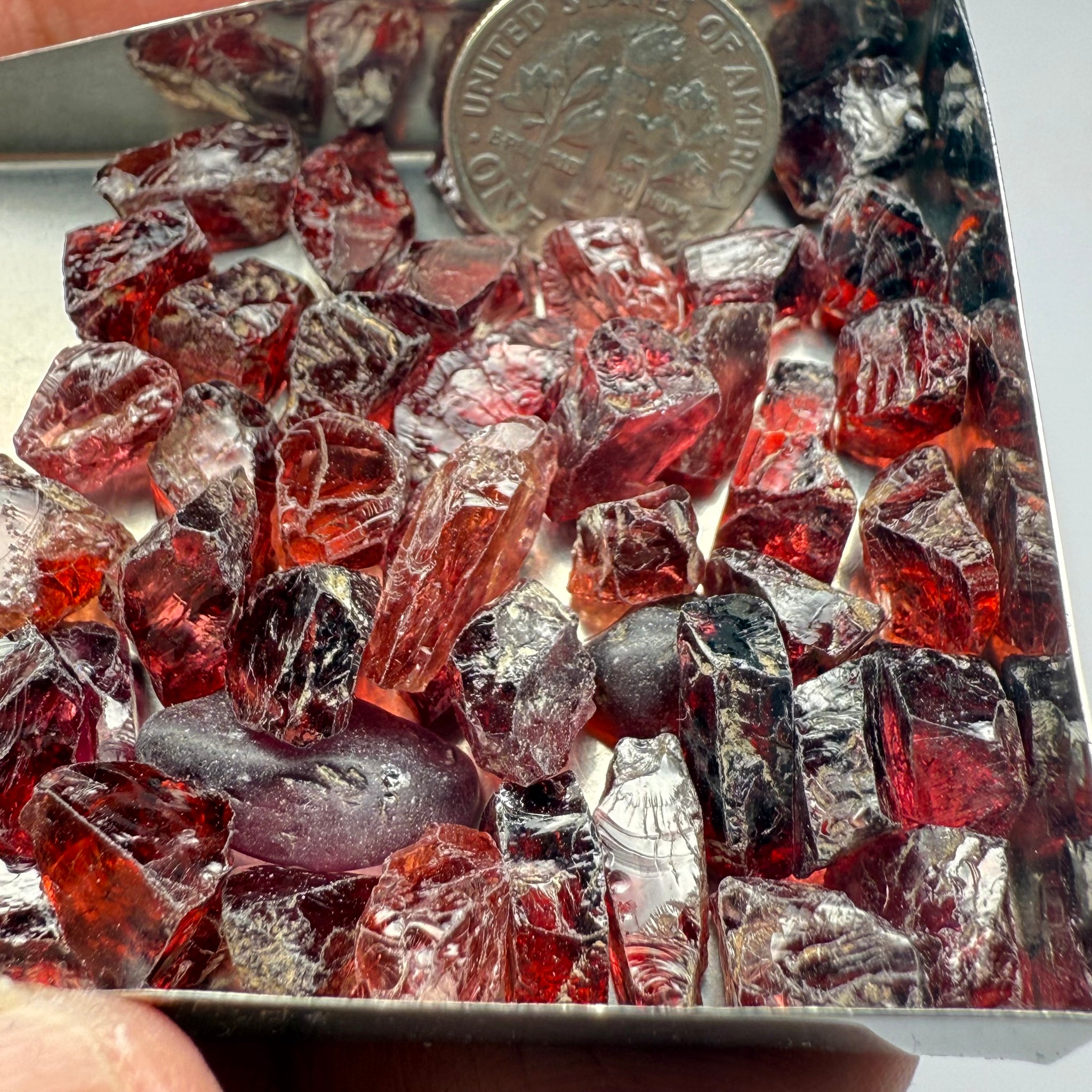 Umba Garnets, Umba Valley, Tanzania, Untreated Unheated. SINGLES price is per piece sold on a blind pour basis, FACETING ROUGH, EYE CLEAN TO SLIGHTLY UNDER EYE CLEAN, av. 3.70ct
