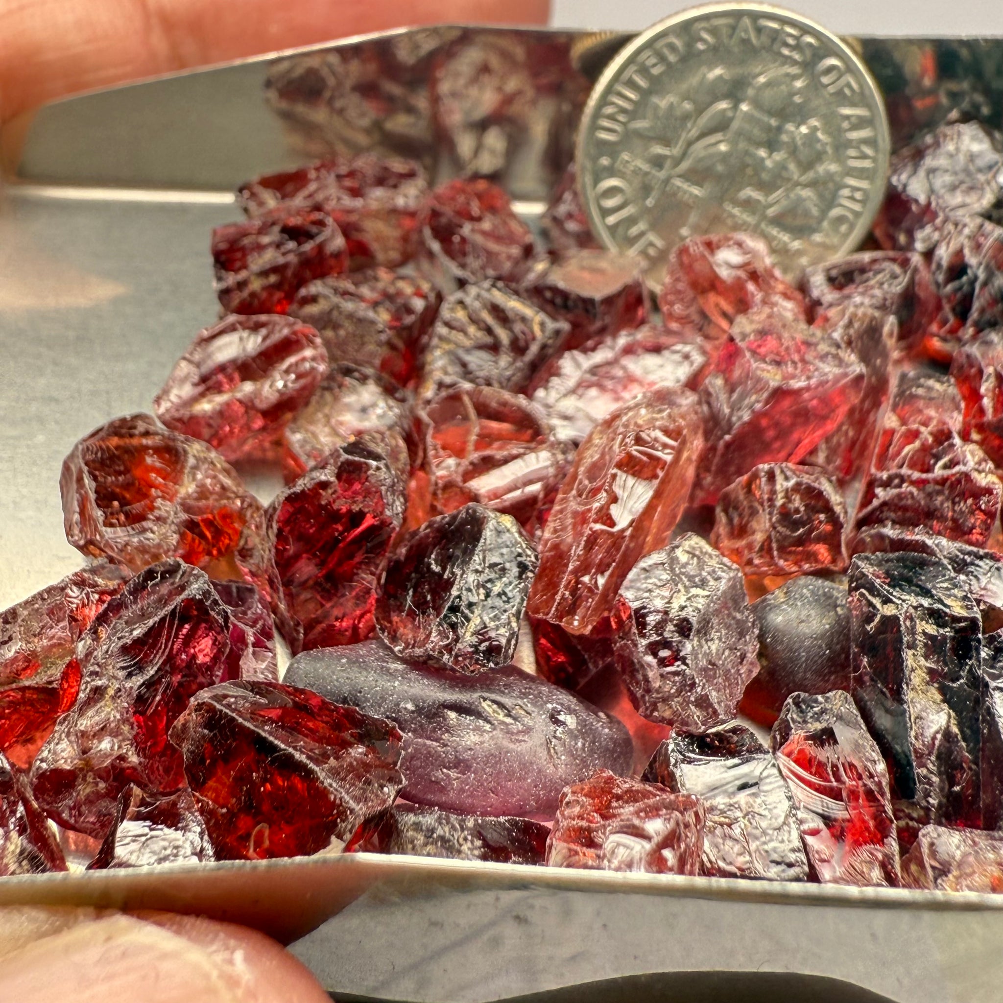 Umba Garnets, Umba Valley, Tanzania, Untreated Unheated. SINGLES price is per piece sold on a blind pour basis, FACETING ROUGH, EYE CLEAN TO SLIGHTLY UNDER EYE CLEAN, av. 3.70ct
