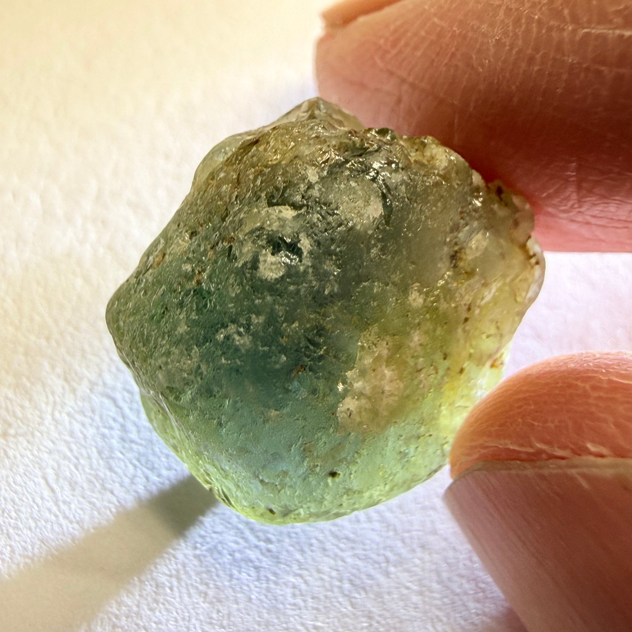 Umba Sapphire, 31.86ct, Umba, Tanzania, Untreated Unheated, low grade with a gemmy portion, you will have to grind though to get to it, portion is slightly to moderately included, see backlit photos