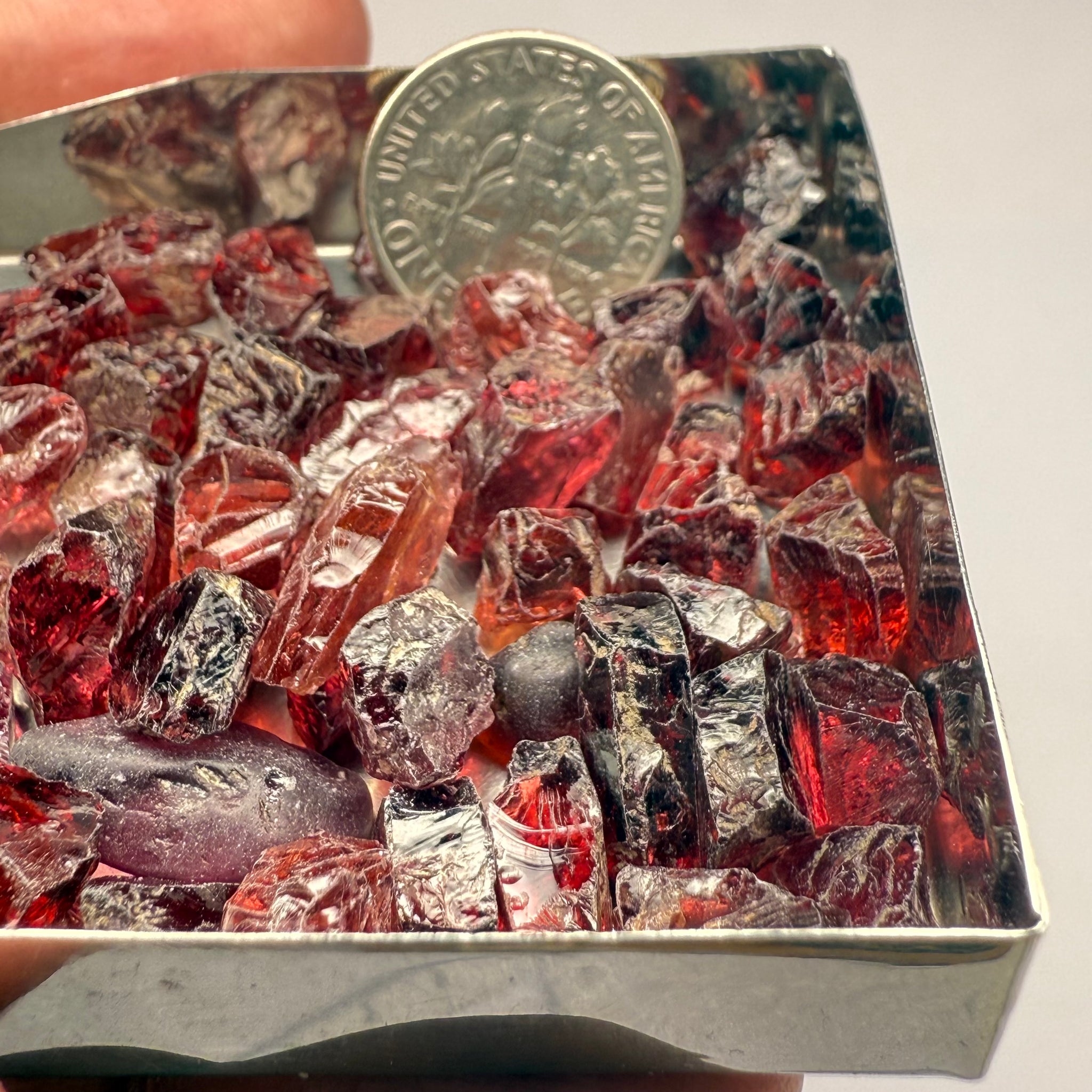 Umba Garnets, Umba Valley, Tanzania, Untreated Unheated. SINGLES price is per piece sold on a blind pour basis, FACETING ROUGH, EYE CLEAN TO SLIGHTLY UNDER EYE CLEAN, av. 3.70ct