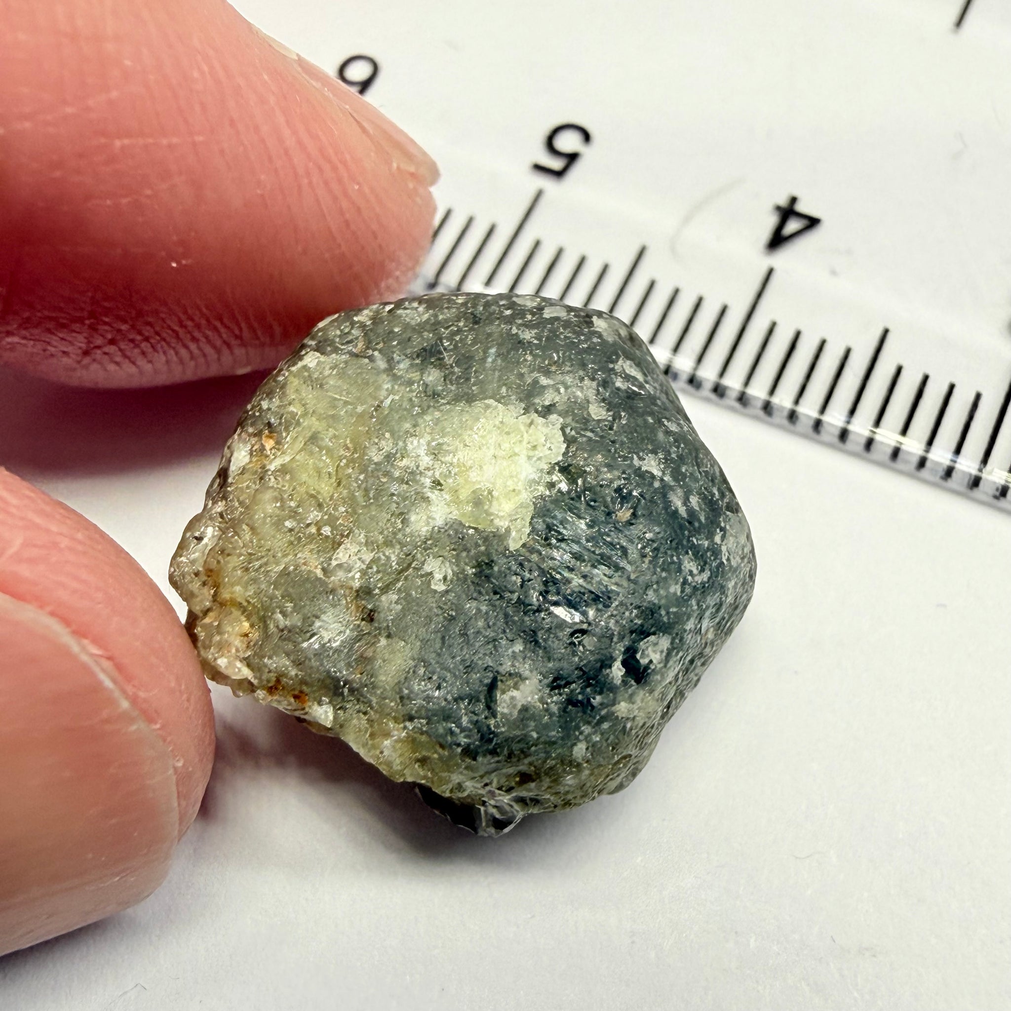 Umba Sapphire, 31.86ct, Umba, Tanzania, Untreated Unheated, low grade with a gemmy portion, you will have to grind though to get to it, portion is slightly to moderately included, see backlit photos