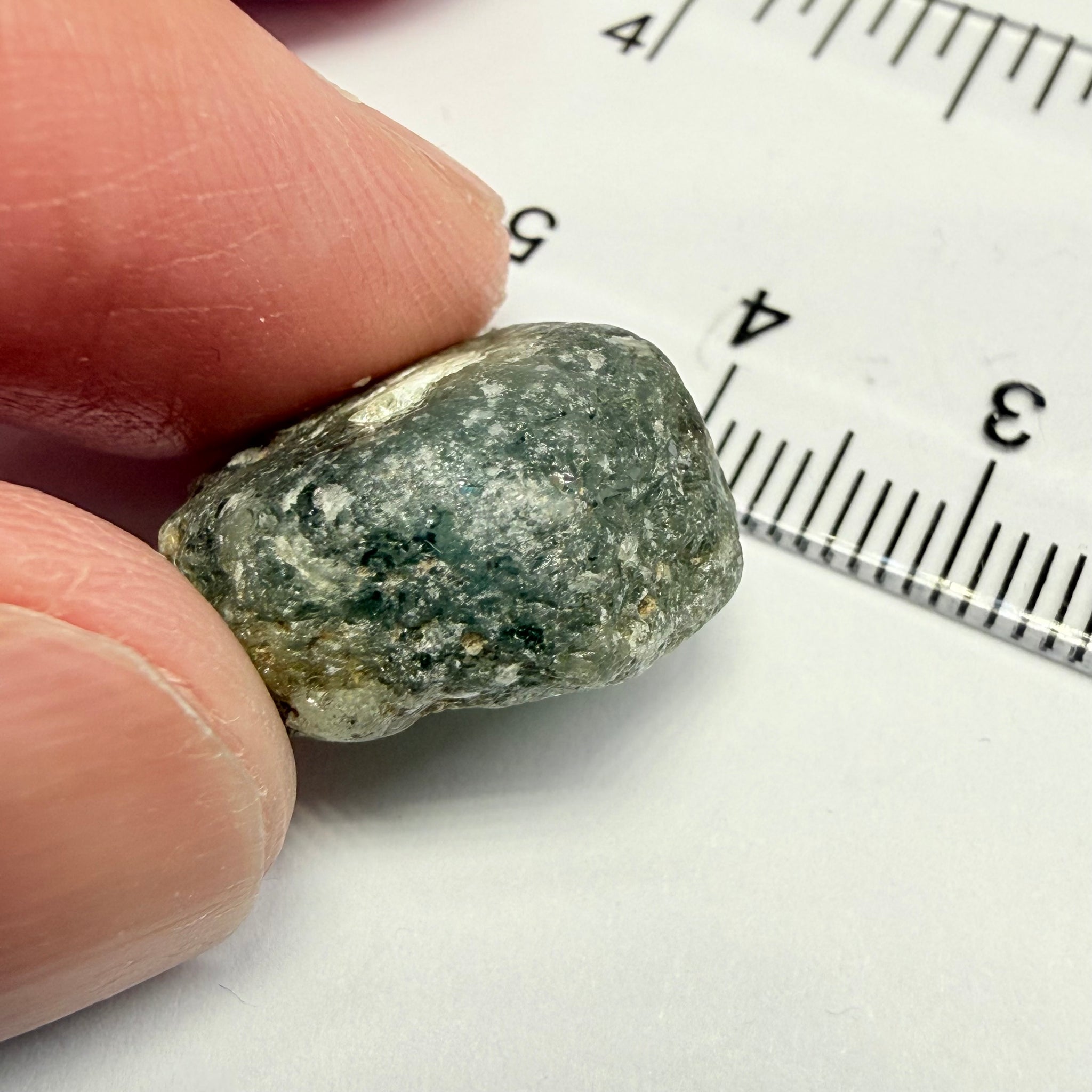 Umba Sapphire, 31.86ct, Umba, Tanzania, Untreated Unheated, low grade with a gemmy portion, you will have to grind though to get to it, portion is slightly to moderately included, see backlit photos