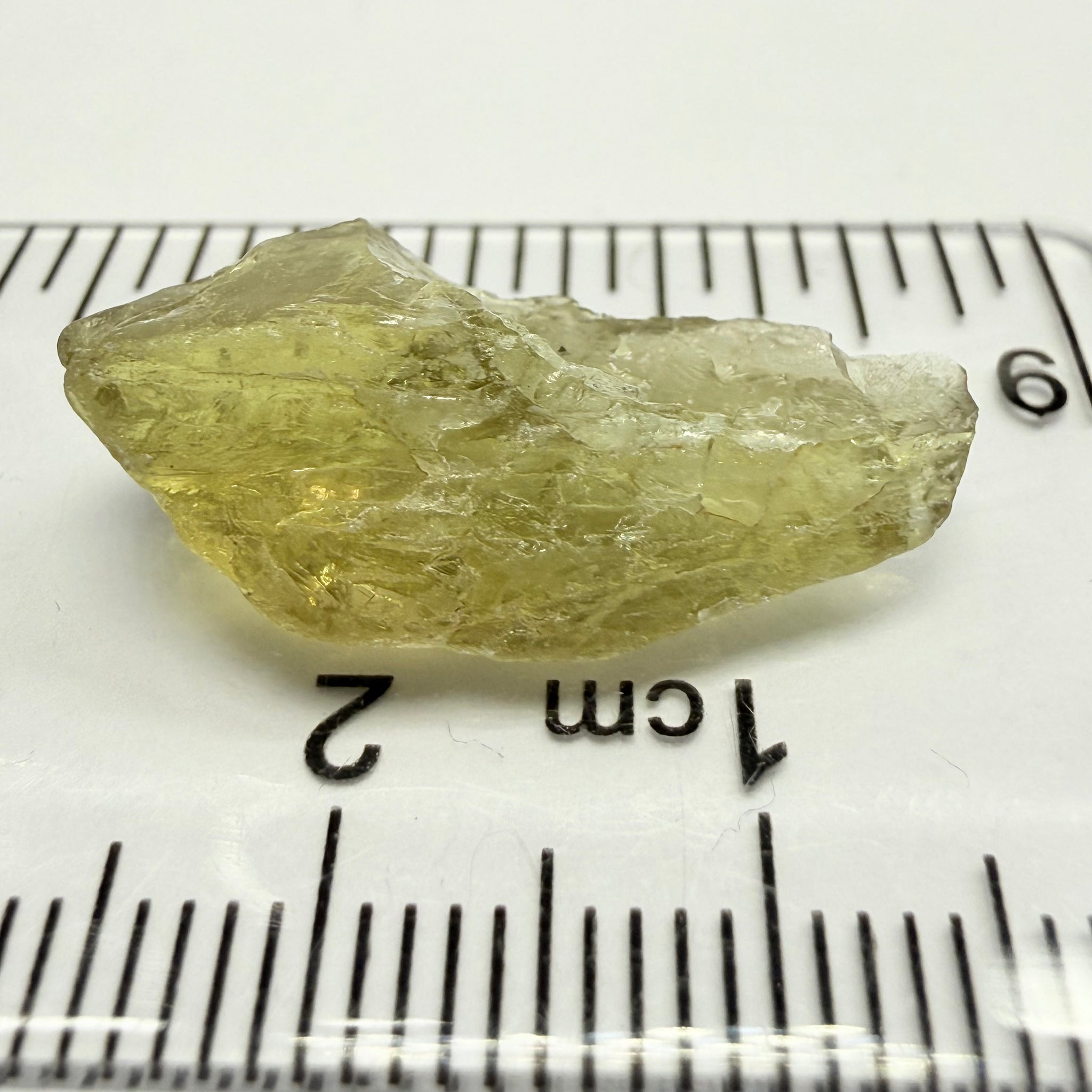 Umba Yellow Sapphire, 13.76ct, Umba, Tanzania, Untreated Unheated, flat stone, there is a fracture at the end, I’ve marked it in one picture, rest is slightly included