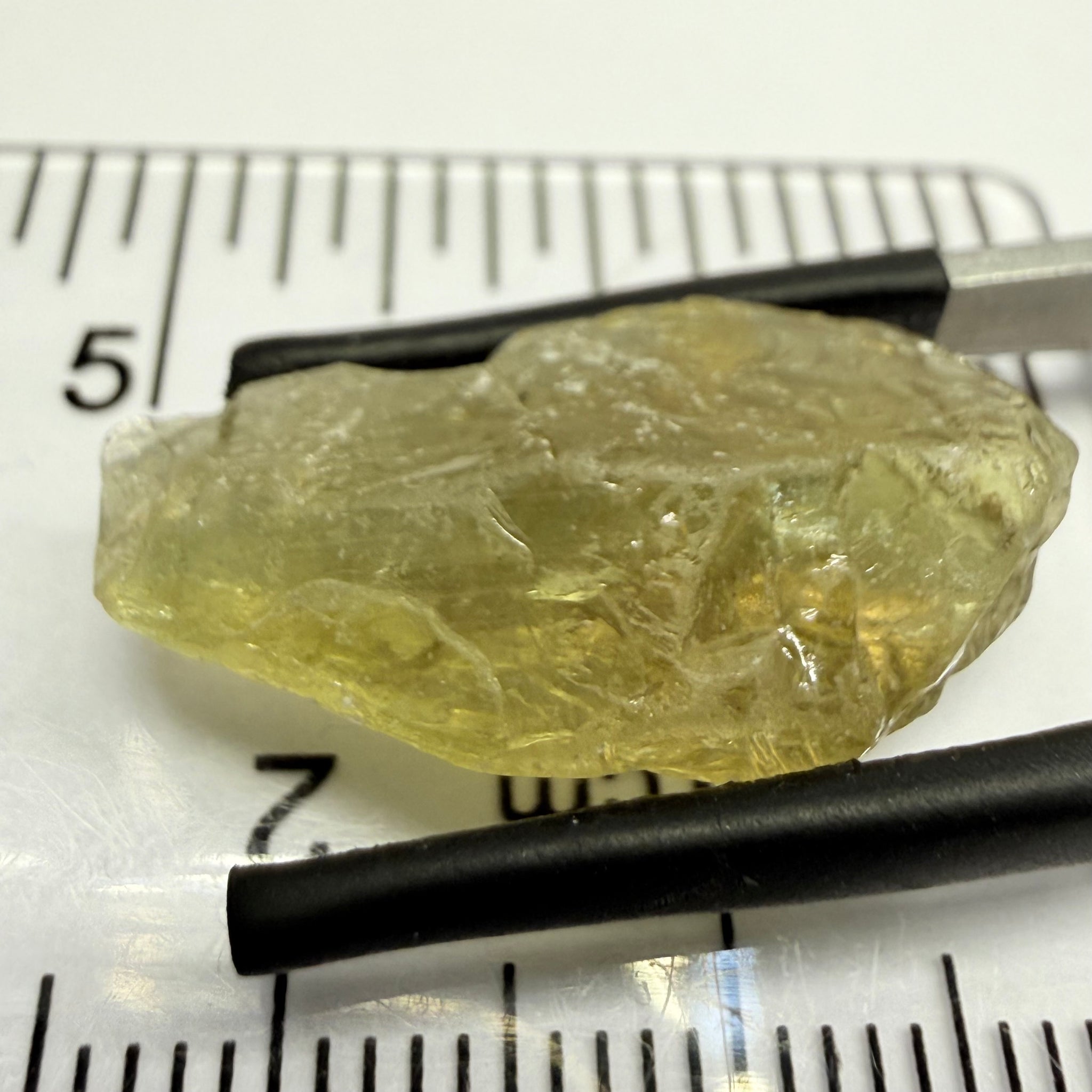 Umba Yellow Sapphire, 13.76ct, Umba, Tanzania, Untreated Unheated, flat stone, there is a fracture at the end, I’ve marked it in one picture, rest is slightly included