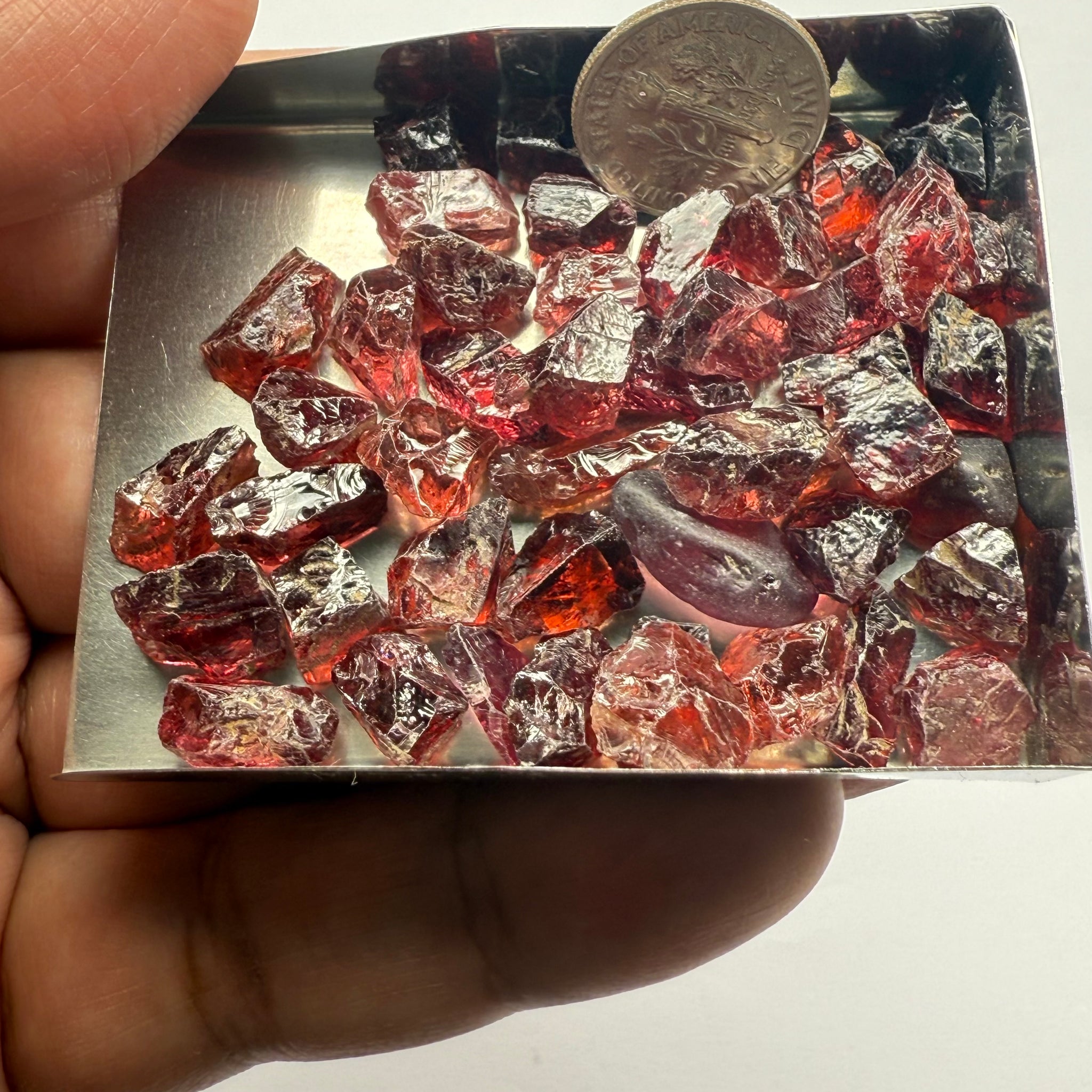 Umba Garnets, Umba Valley, Tanzania, Untreated Unheated. SINGLES price is per piece sold on a blind pour basis, FACETING ROUGH, EYE CLEAN TO SLIGHTLY UNDER EYE CLEAN, av. 3.70ct