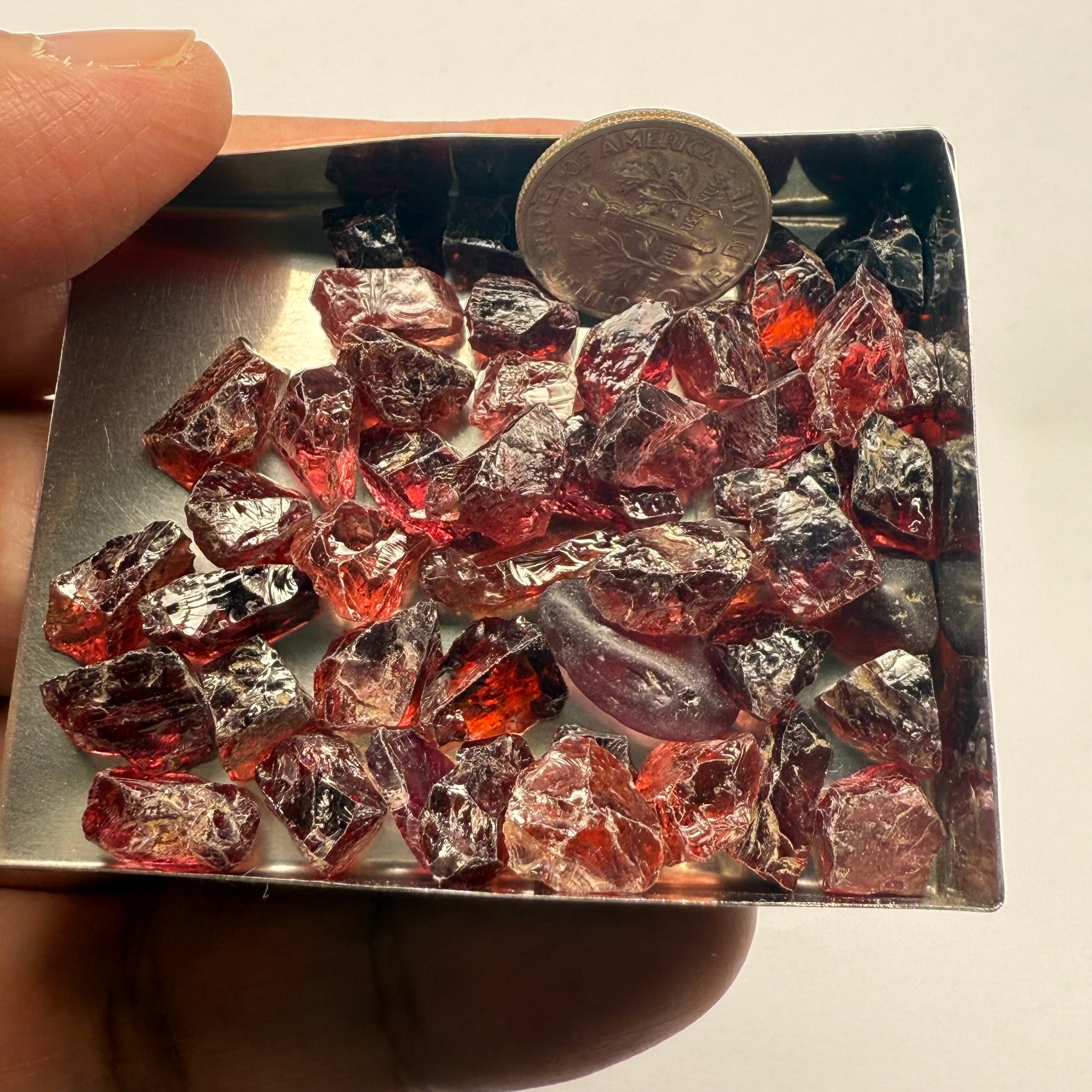 Umba Garnets, Umba Valley, Tanzania, Untreated Unheated. SINGLES price is per piece sold on a blind pour basis, FACETING ROUGH, EYE CLEAN TO SLIGHTLY UNDER EYE CLEAN, av. 3.70ct