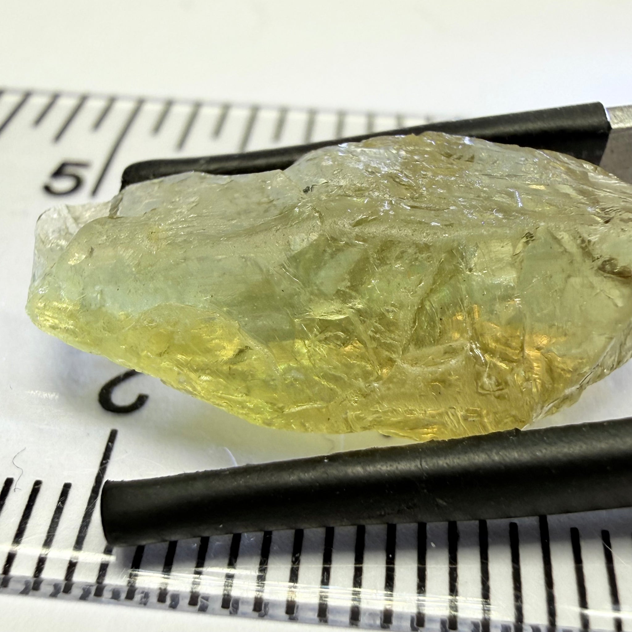 Umba Yellow Sapphire, 13.76ct, Umba, Tanzania, Untreated Unheated, flat stone, there is a fracture at the end, I’ve marked it in one picture, rest is slightly included