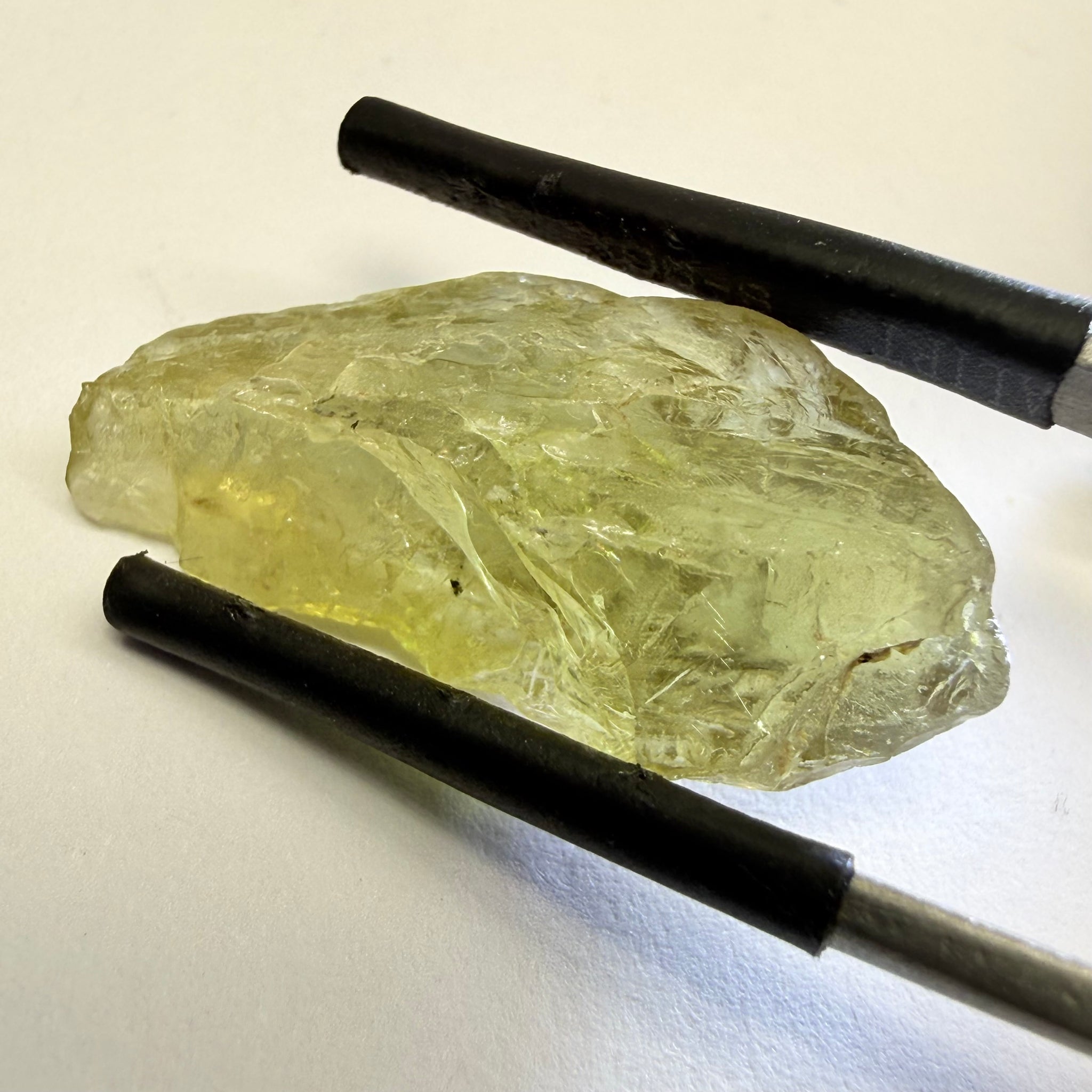 Umba Yellow Sapphire, 13.76ct, Umba, Tanzania, Untreated Unheated, flat stone, there is a fracture at the end, I’ve marked it in one picture, rest is slightly included