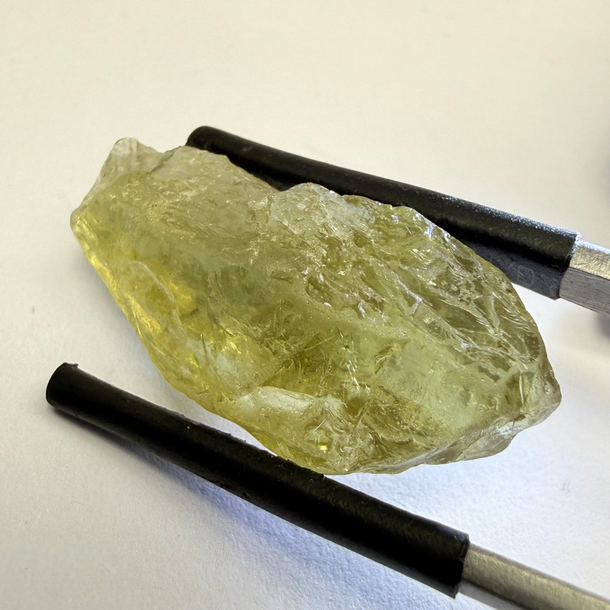 Umba Yellow Sapphire, 13.76ct, Umba, Tanzania, Untreated Unheated, flat stone, there is a fracture at the end, I’ve marked it in one picture, rest is slightly included