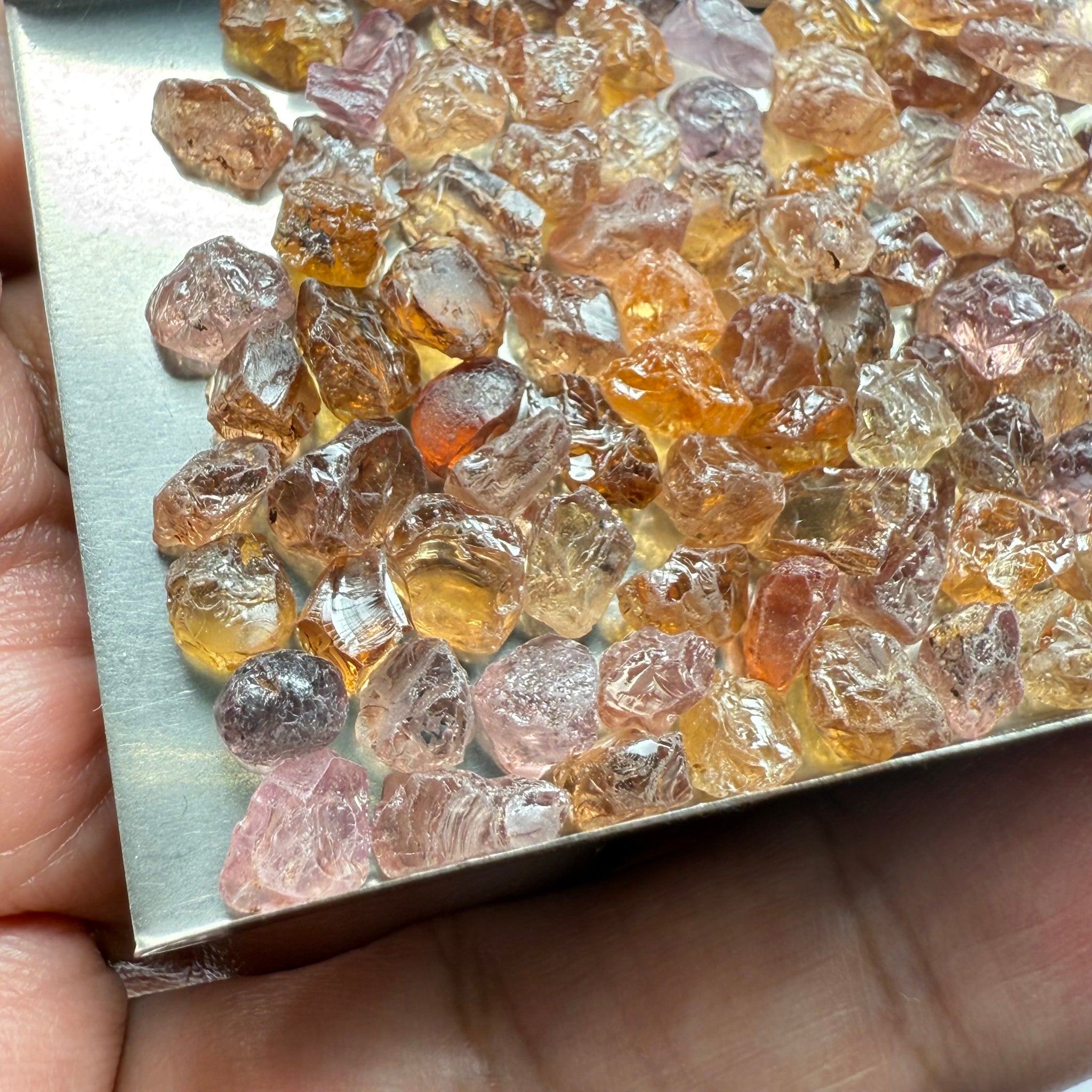 Garnet MIX, look closely it’s a whole mix of Mandarins, Colour Changers, Lindi, Mahenge Garnets and more all mixed up, see closeup, Tanzania, Untreated Unheated. SINGLES price is per piece sold on a blind pour basis, some clean some included, av. 1.4ct