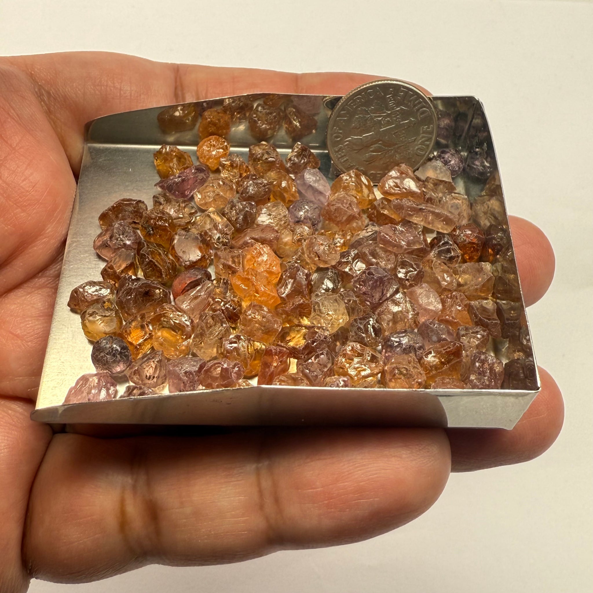 Garnet MIX, look closely it’s a whole mix of Mandarins, Colour Changers, Lindi, Mahenge Garnets and more all mixed up, see closeup, Tanzania, Untreated Unheated. SINGLES price is per piece sold on a blind pour basis, some clean some included, av. 1.4ct
