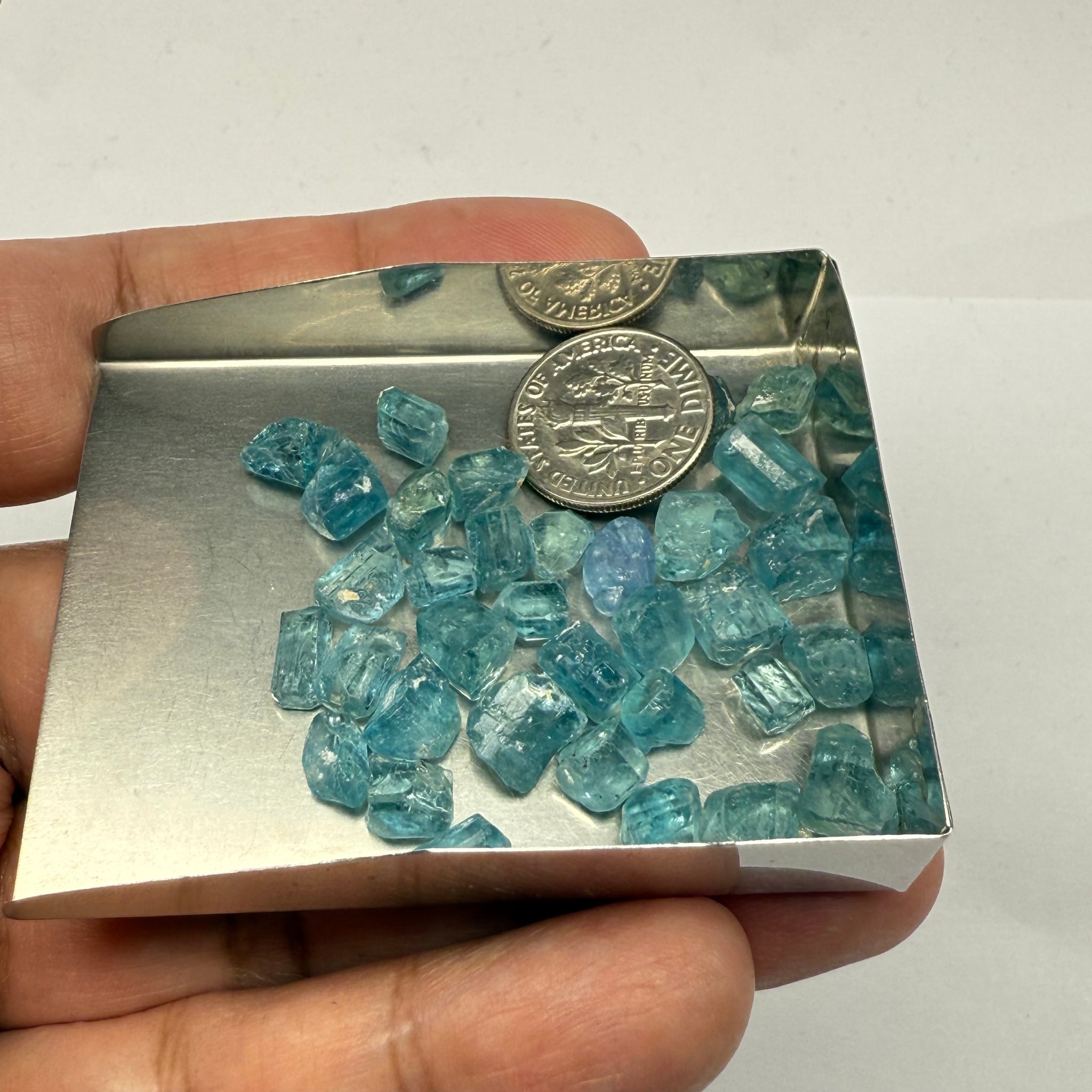 Blue Apatite Crystals from Merelani, Tanzania, Untreated Unheated. SINGLES price is per piece sold on a blind pour basis, av. 1.45ct