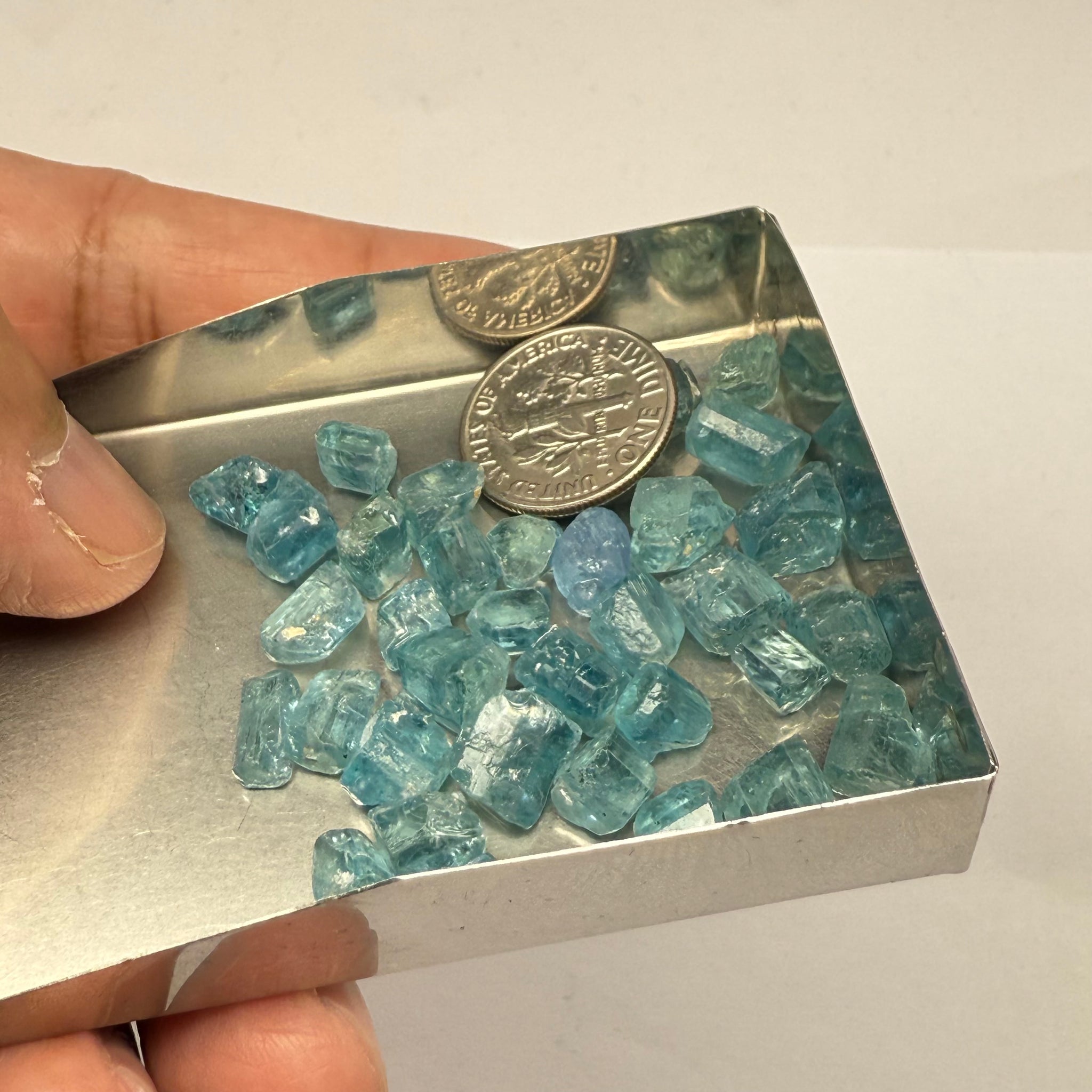 Blue Apatite Crystals from Merelani, Tanzania, Untreated Unheated. SINGLES price is per piece sold on a blind pour basis, av. 1.45ct