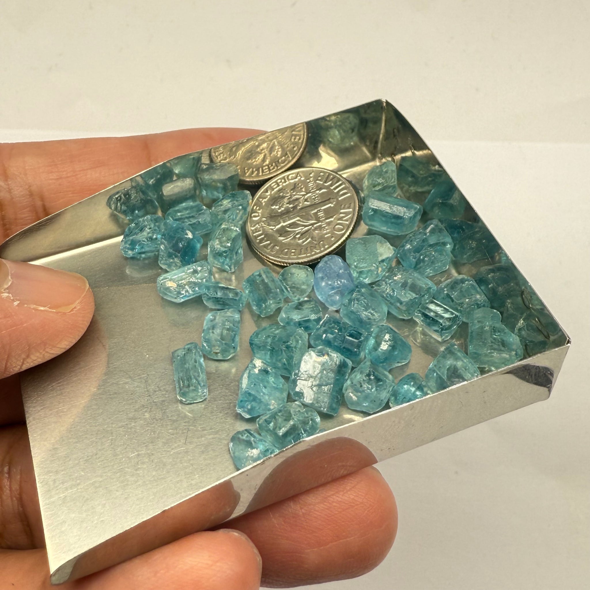 Blue Apatite Crystals from Merelani, Tanzania, Untreated Unheated. SINGLES price is per piece sold on a blind pour basis, av. 1.45ct