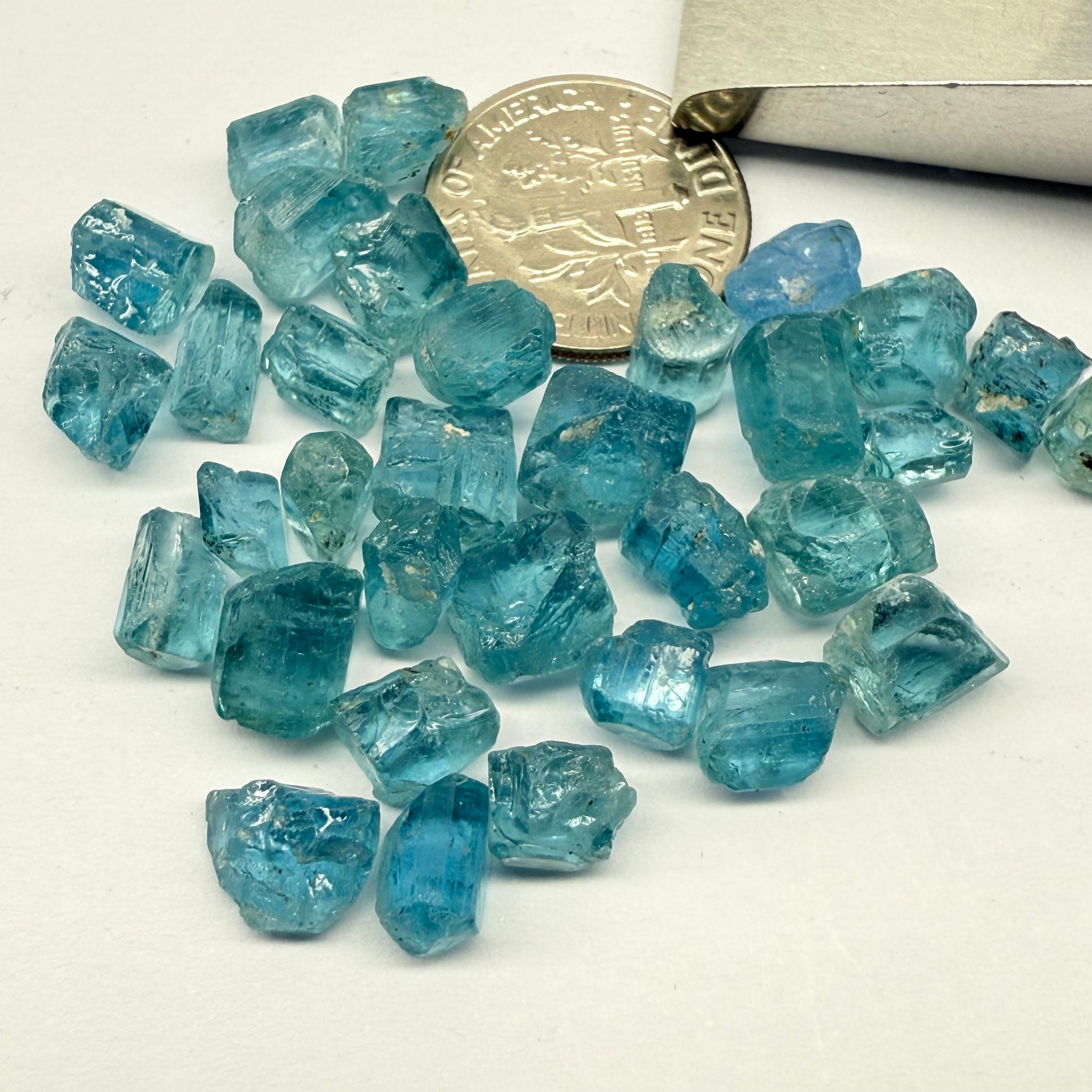 Blue Apatite Crystals from Merelani, Tanzania, Untreated Unheated. SINGLES price is per piece sold on a blind pour basis, av. 1.45ct