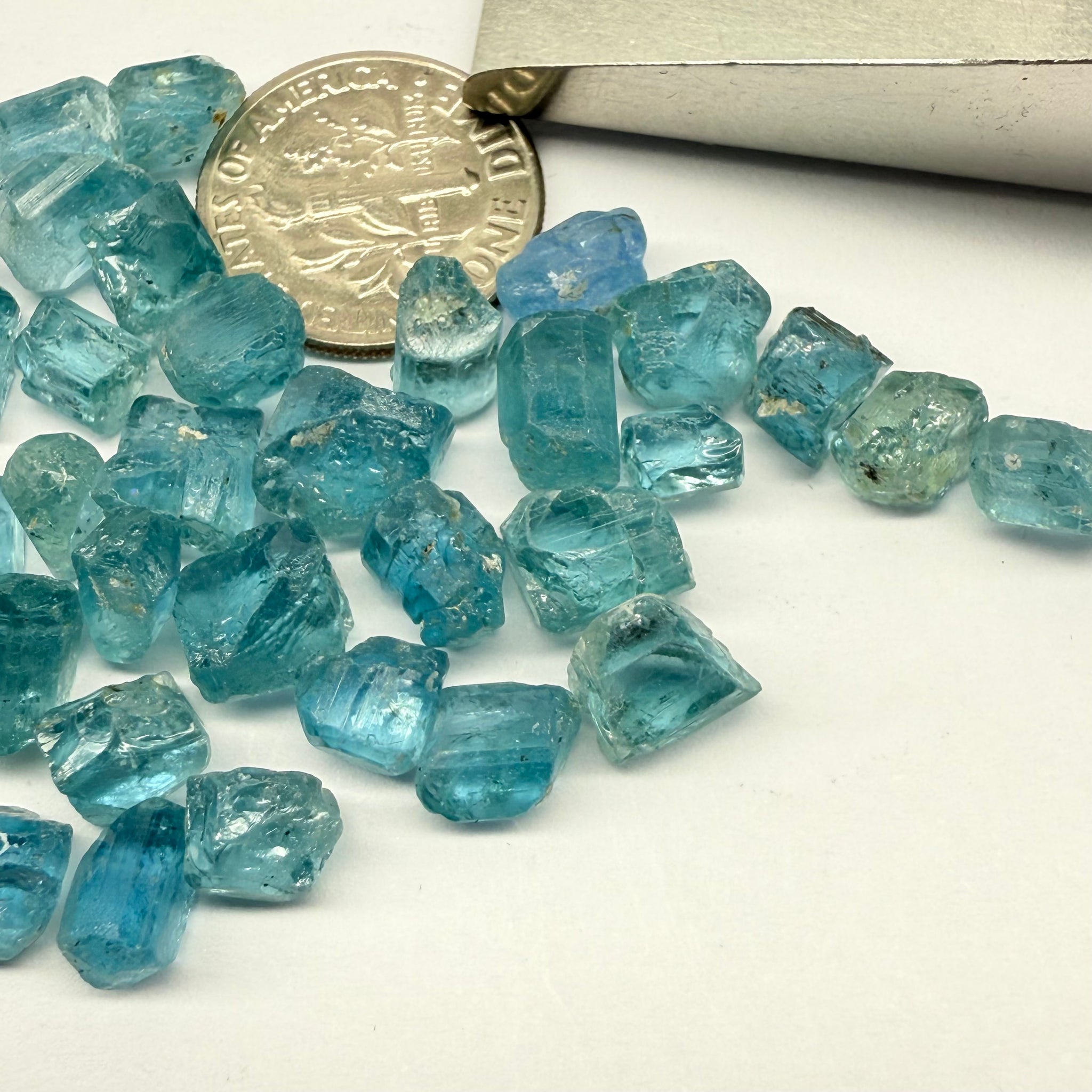 Blue Apatite Crystals from Merelani, Tanzania, Untreated Unheated. SINGLES price is per piece sold on a blind pour basis, av. 1.45ct