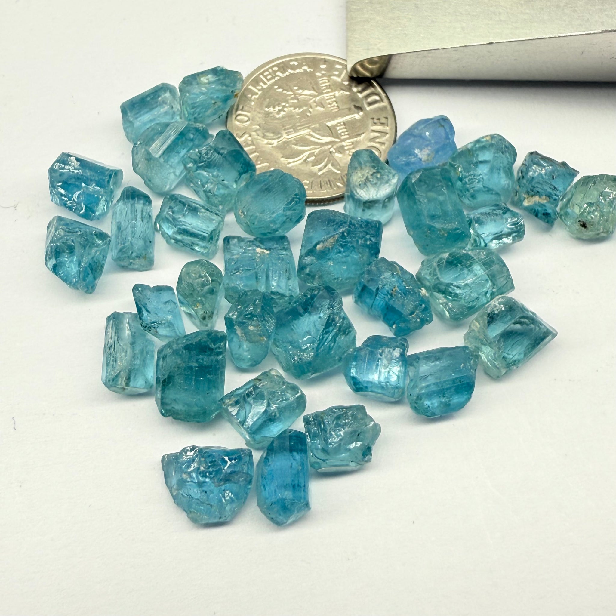 Blue Apatite Crystals from Merelani, Tanzania, Untreated Unheated. SINGLES price is per piece sold on a blind pour basis, av. 1.45ct