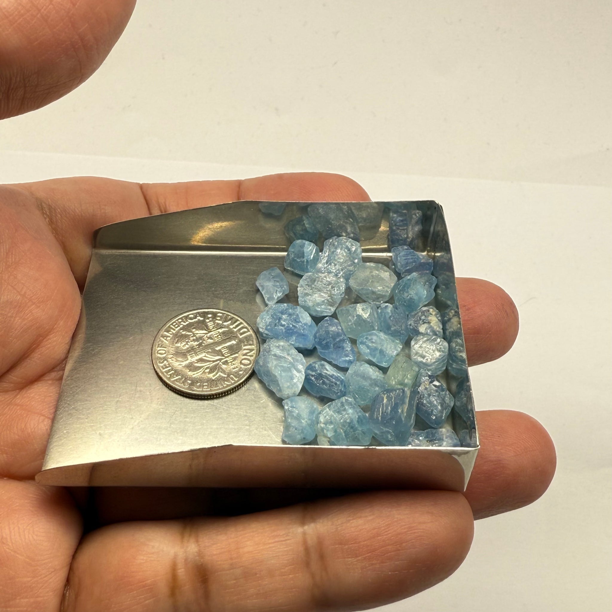 Blue Apatite Crystals from Merelani, Tanzania, Untreated Unheated. SINGLES price is per piece sold on a blind pour basis, specimen grade