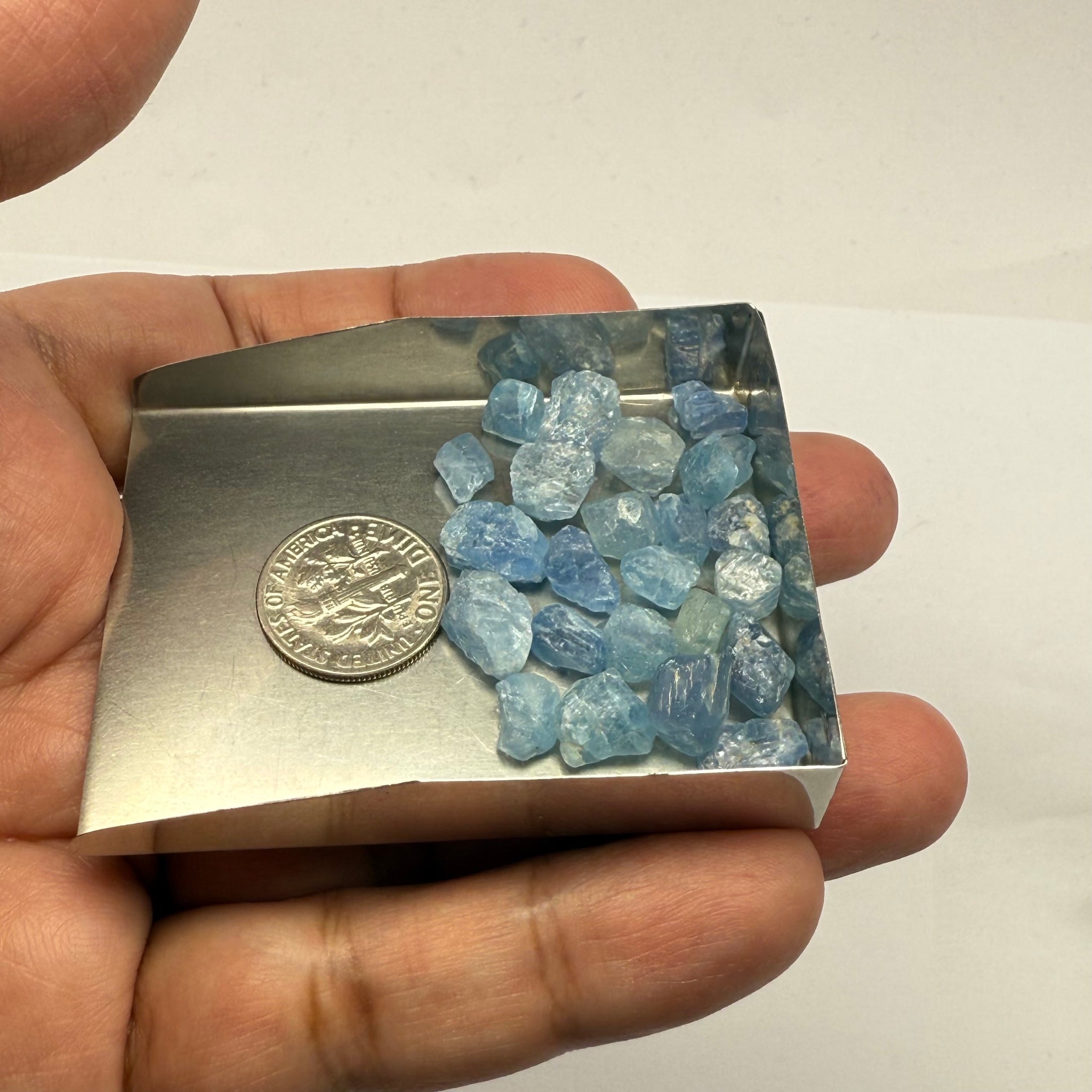 Blue Apatite Crystals from Merelani, Tanzania, Untreated Unheated. SINGLES price is per piece sold on a blind pour basis, specimen grade