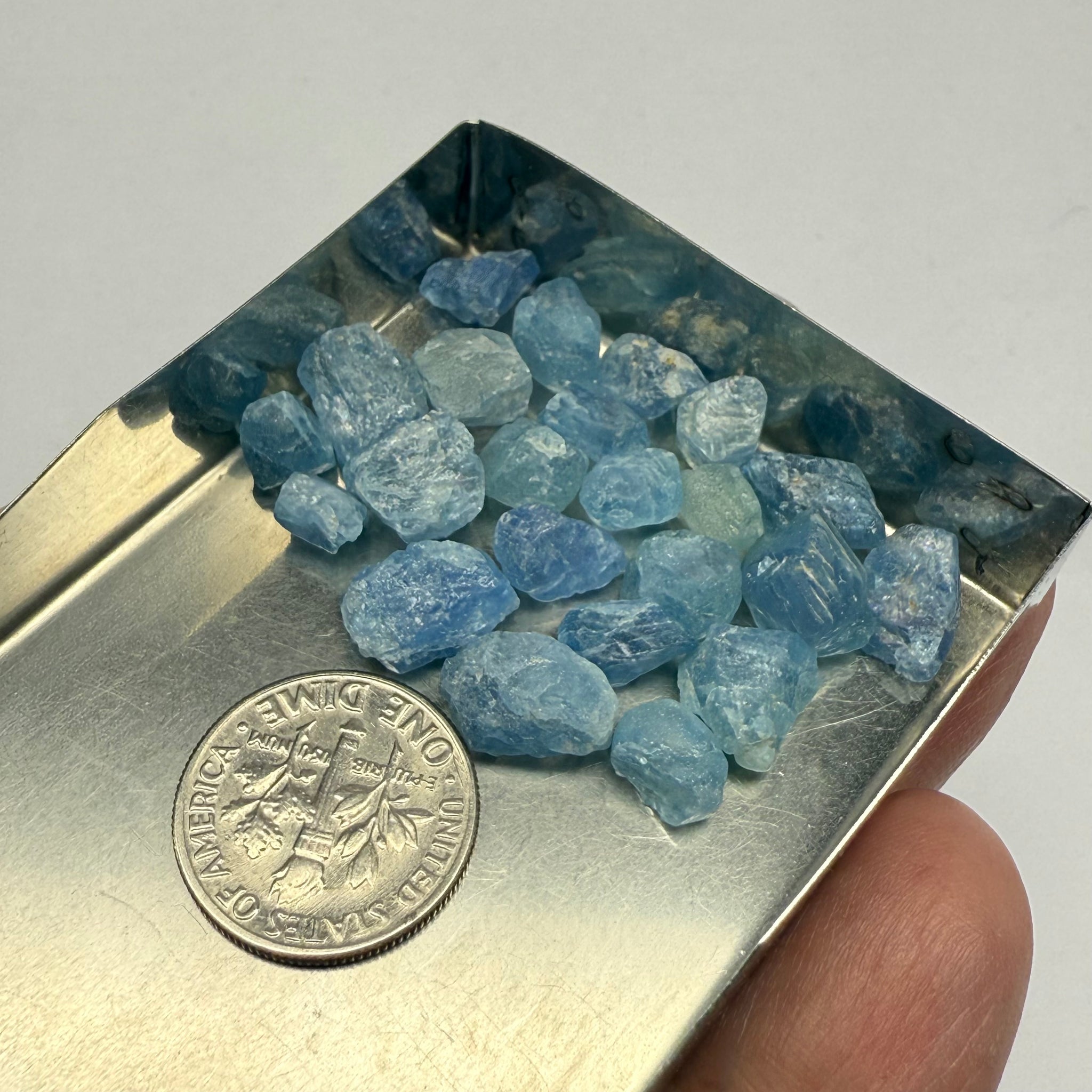 Blue Apatite Crystals from Merelani, Tanzania, Untreated Unheated. SINGLES price is per piece sold on a blind pour basis, specimen grade