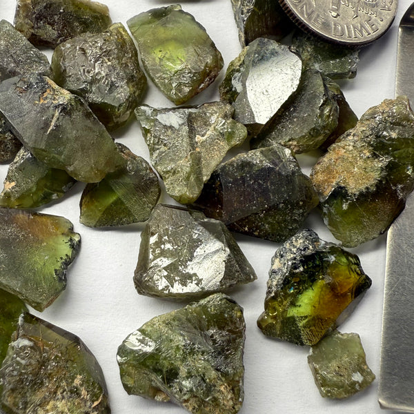 Gemmy Vanadium Sphene Crystals from Mondo (same mine as mondo quartz), Tanzania, Untreated Unheated. SINGLES price is per piece sold on a blind pour basis, specimen grade, you could facet them but they are classic Sphene “wedge” shapes