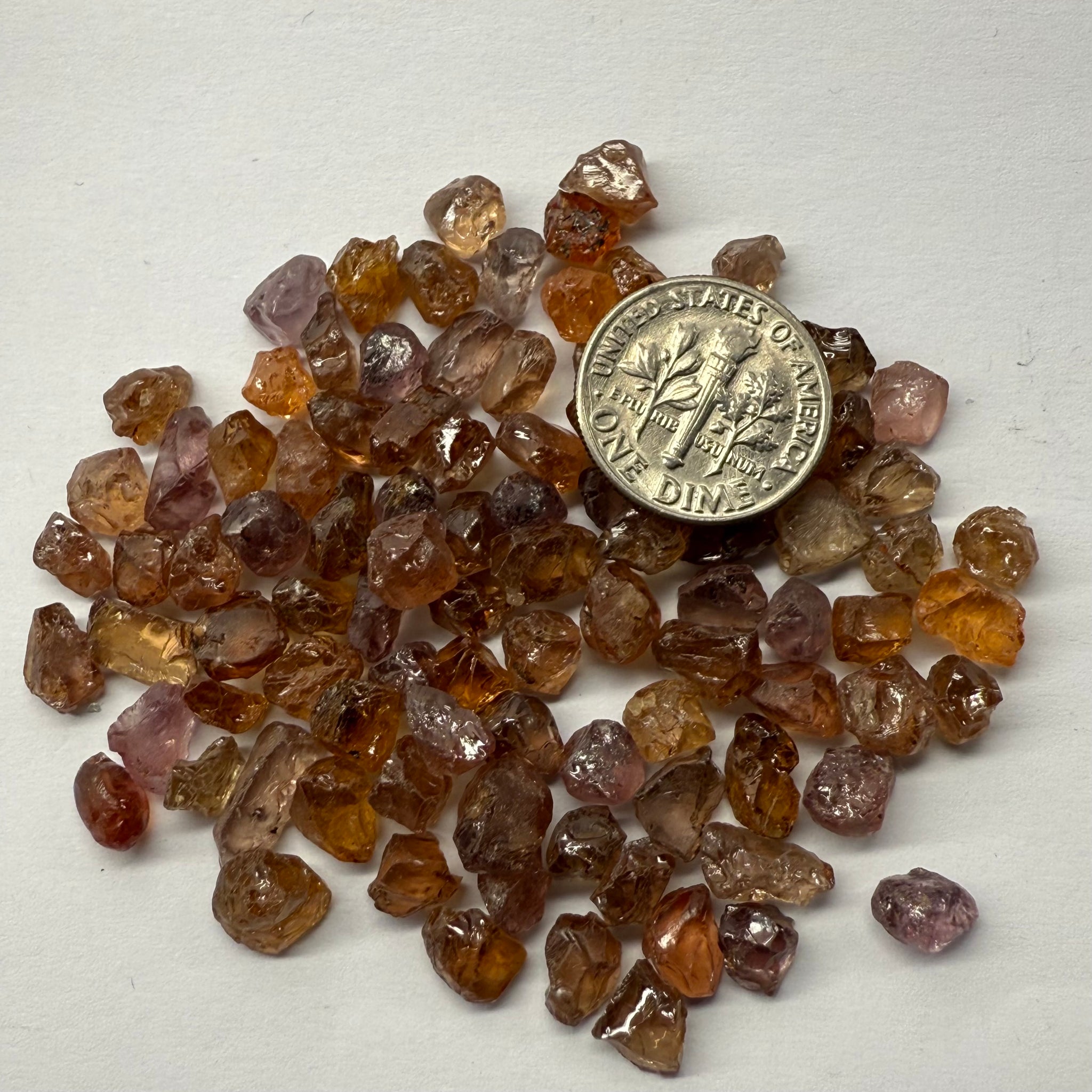 Garnet MIX, look closely it’s a whole mix of Mandarins, Colour Changers, Lindi, Mahenge Garnets and more all mixed up, see closeup, Tanzania, Untreated Unheated. SINGLES price is per piece sold on a blind pour basis, some clean some included, av. 1.4ct