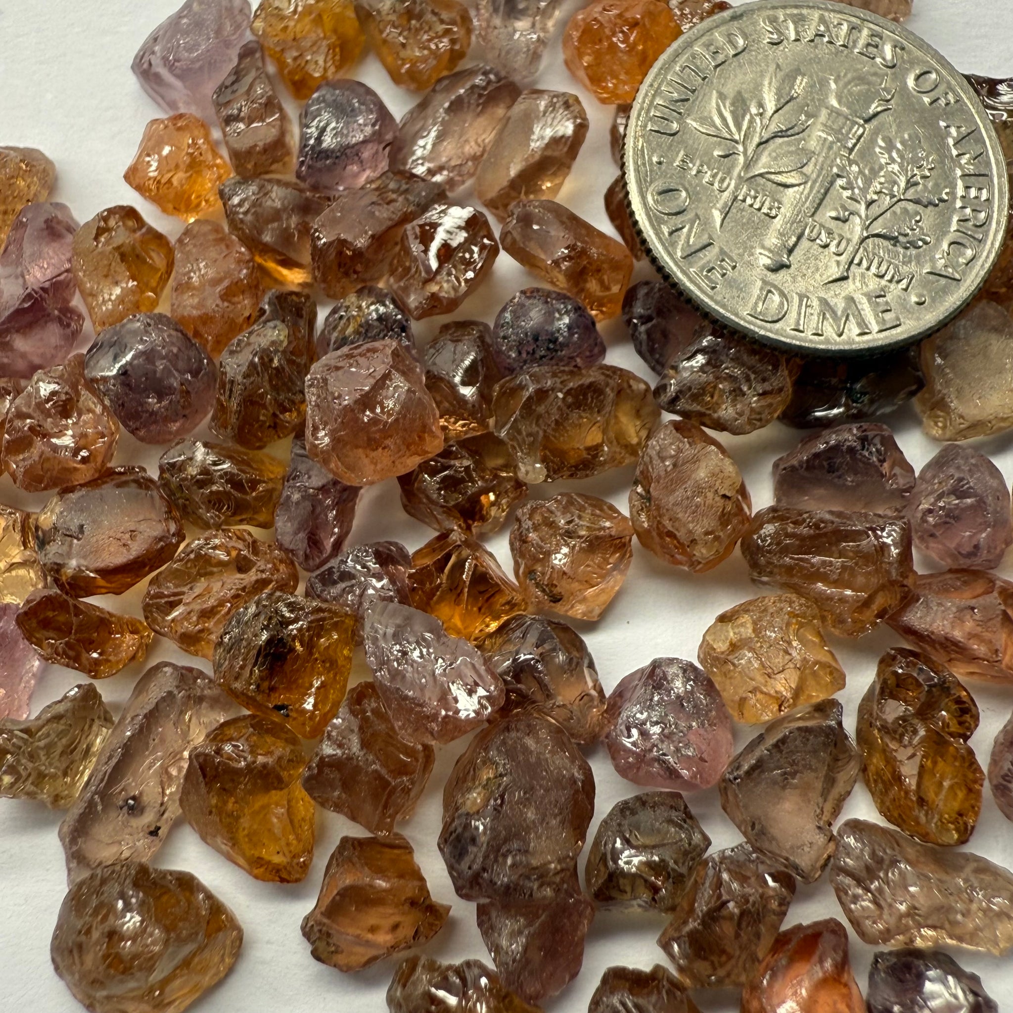 Garnet MIX, look closely it’s a whole mix of Mandarins, Colour Changers, Lindi, Mahenge Garnets and more all mixed up, see closeup, Tanzania, Untreated Unheated. SINGLES price is per piece sold on a blind pour basis, some clean some included, av. 1.4ct