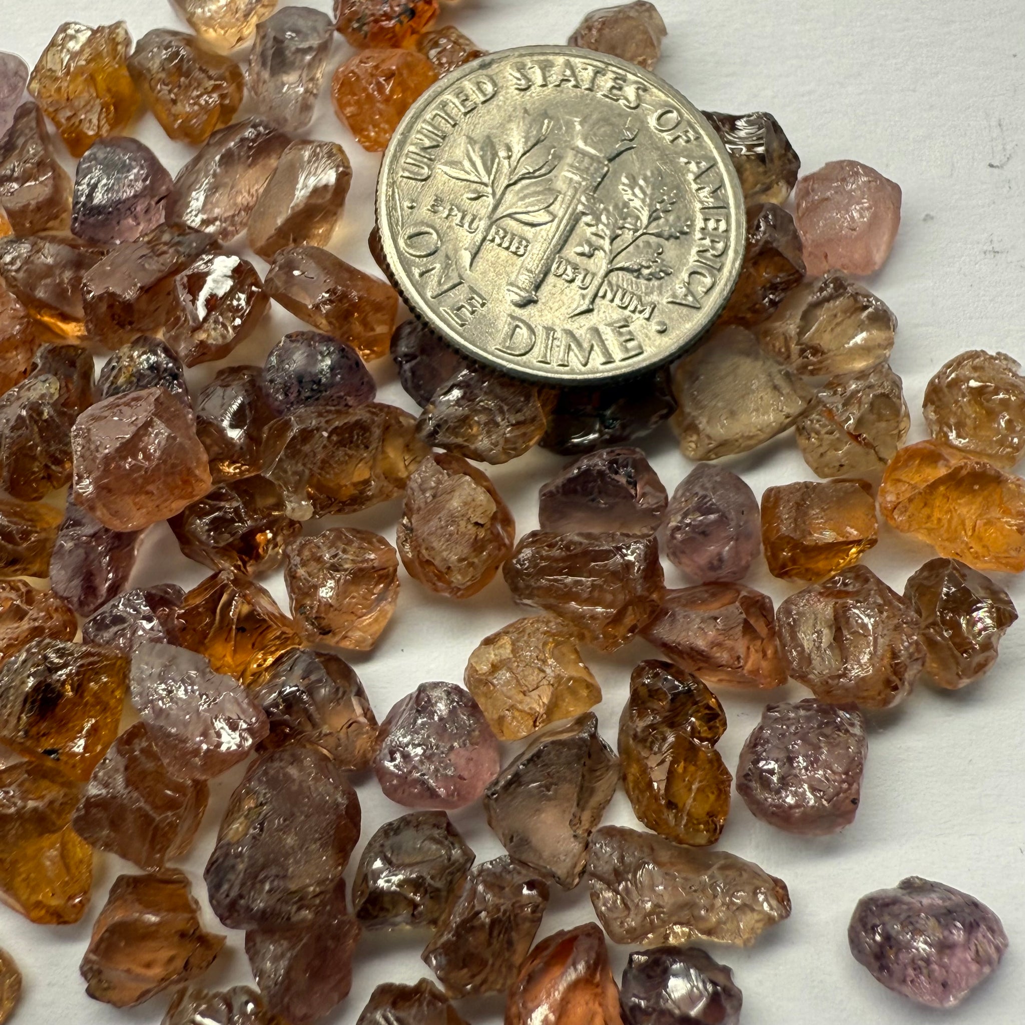 Garnet MIX, look closely it’s a whole mix of Mandarins, Colour Changers, Lindi, Mahenge Garnets and more all mixed up, see closeup, Tanzania, Untreated Unheated. SINGLES price is per piece sold on a blind pour basis, some clean some included, av. 1.4ct