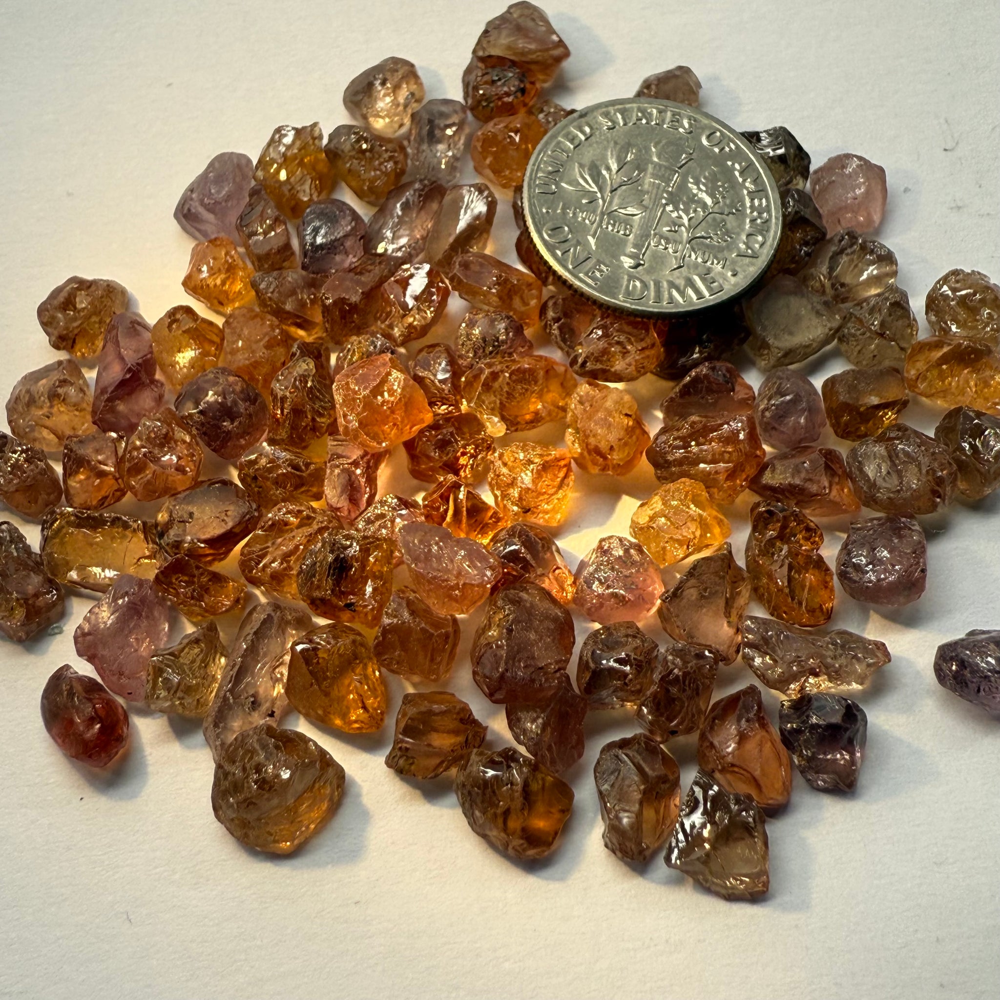 Garnet MIX, look closely it’s a whole mix of Mandarins, Colour Changers, Lindi, Mahenge Garnets and more all mixed up, see closeup, Tanzania, Untreated Unheated. SINGLES price is per piece sold on a blind pour basis, some clean some included, av. 1.4ct