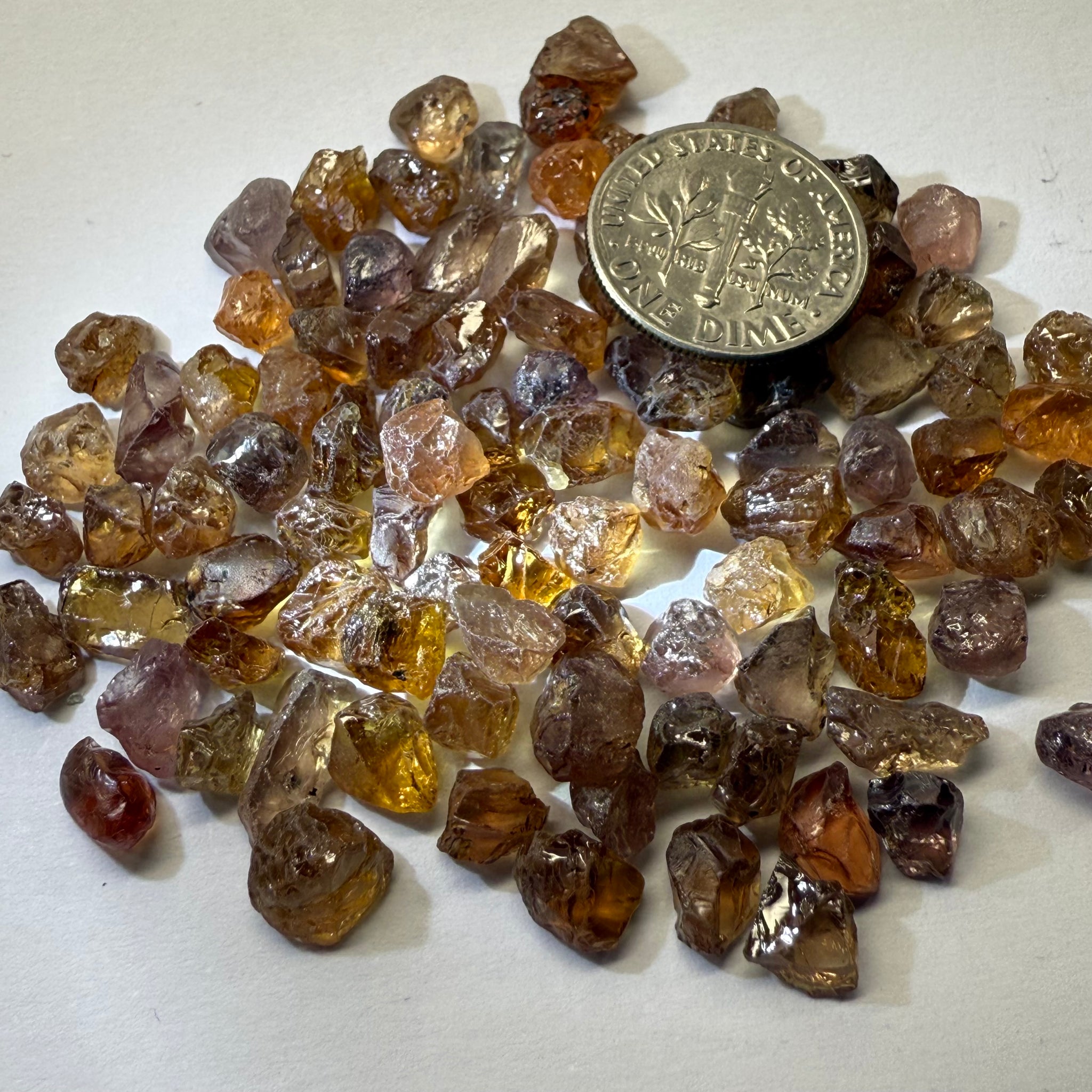 Garnet MIX, look closely it’s a whole mix of Mandarins, Colour Changers, Lindi, Mahenge Garnets and more all mixed up, see closeup, Tanzania, Untreated Unheated. SINGLES price is per piece sold on a blind pour basis, some clean some included, av. 1.4ct