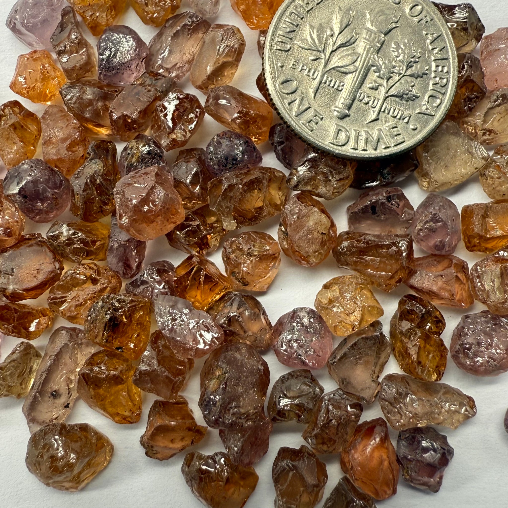 Garnet MIX, look closely it’s a whole mix of Mandarins, Colour Changers, Lindi, Mahenge Garnets and more all mixed up, see closeup, Tanzania, Untreated Unheated. SINGLES price is per piece sold on a blind pour basis, some clean some included, av. 1.4ct