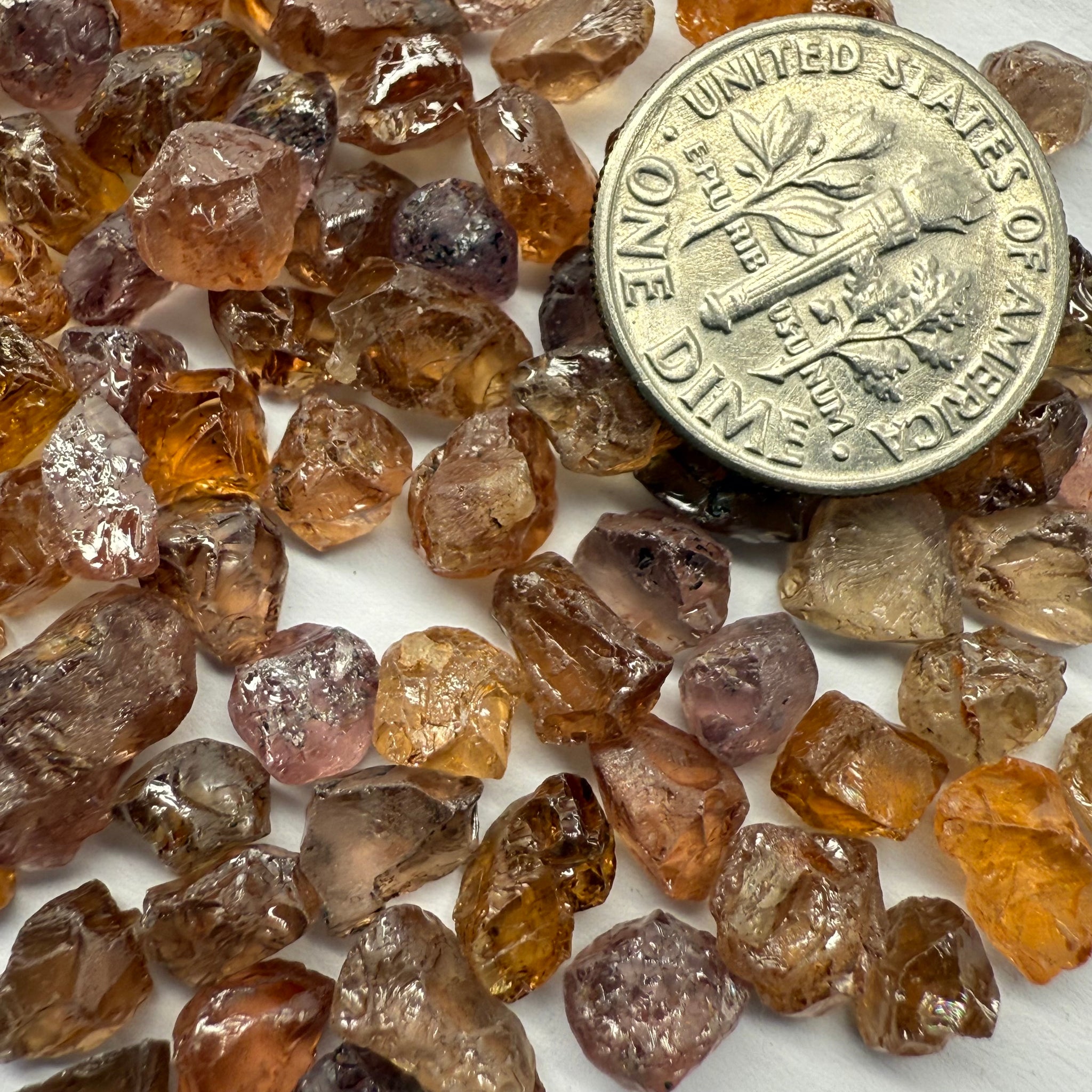 Garnet MIX, look closely it’s a whole mix of Mandarins, Colour Changers, Lindi, Mahenge Garnets and more all mixed up, see closeup, Tanzania, Untreated Unheated. SINGLES price is per piece sold on a blind pour basis, some clean some included, av. 1.4ct