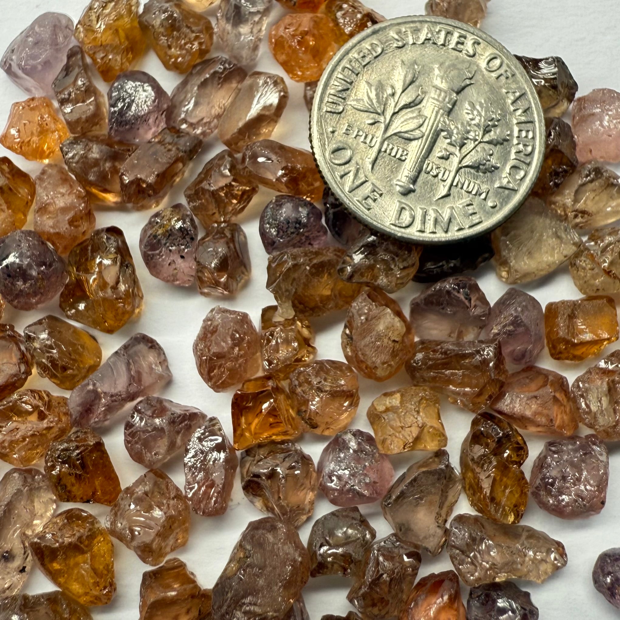 Garnet MIX, look closely it’s a whole mix of Mandarins, Colour Changers, Lindi, Mahenge Garnets and more all mixed up, see closeup, Tanzania, Untreated Unheated. SINGLES price is per piece sold on a blind pour basis, some clean some included, av. 1.4ct